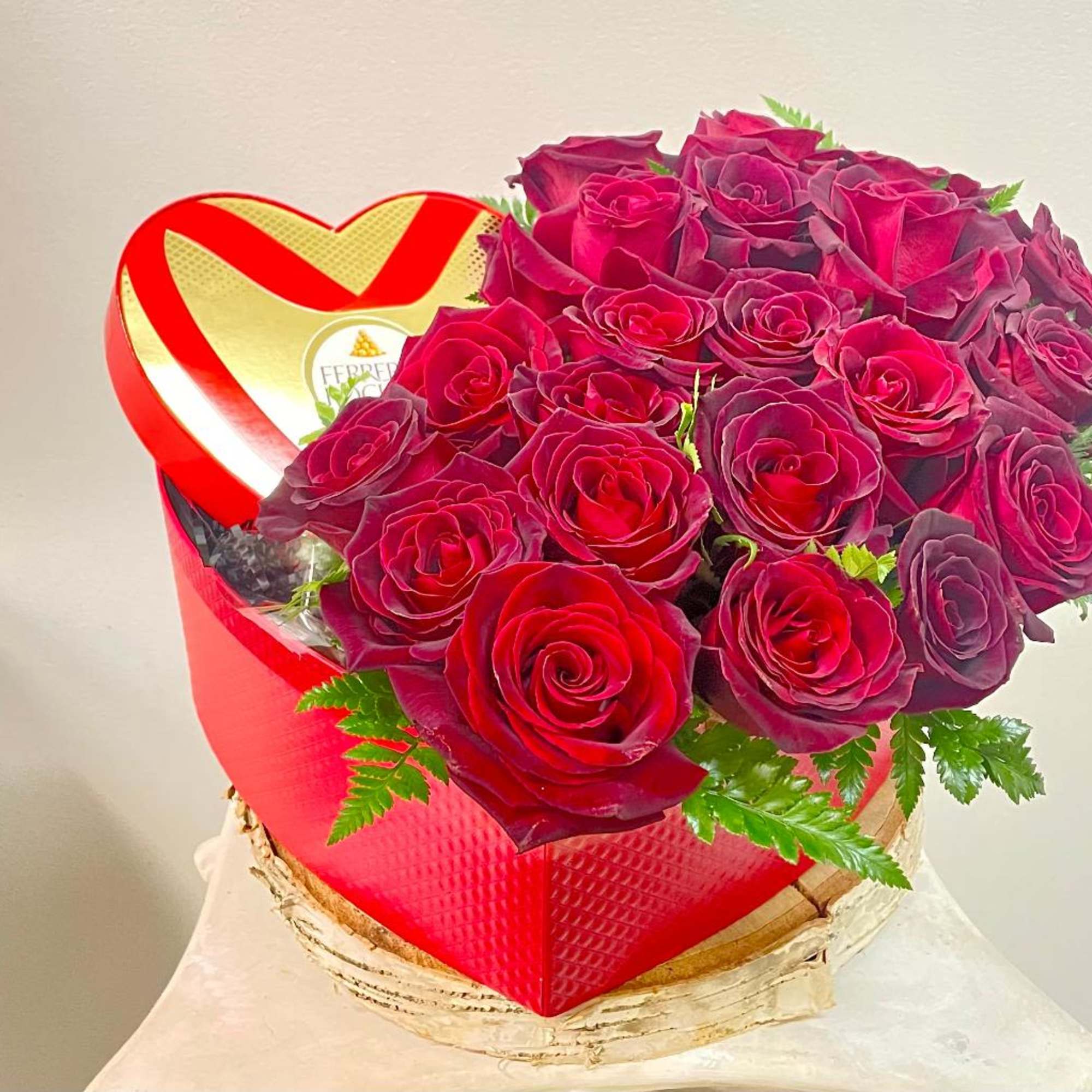The best heart shaped box gift with red roses and chocolate .
Gorgeous