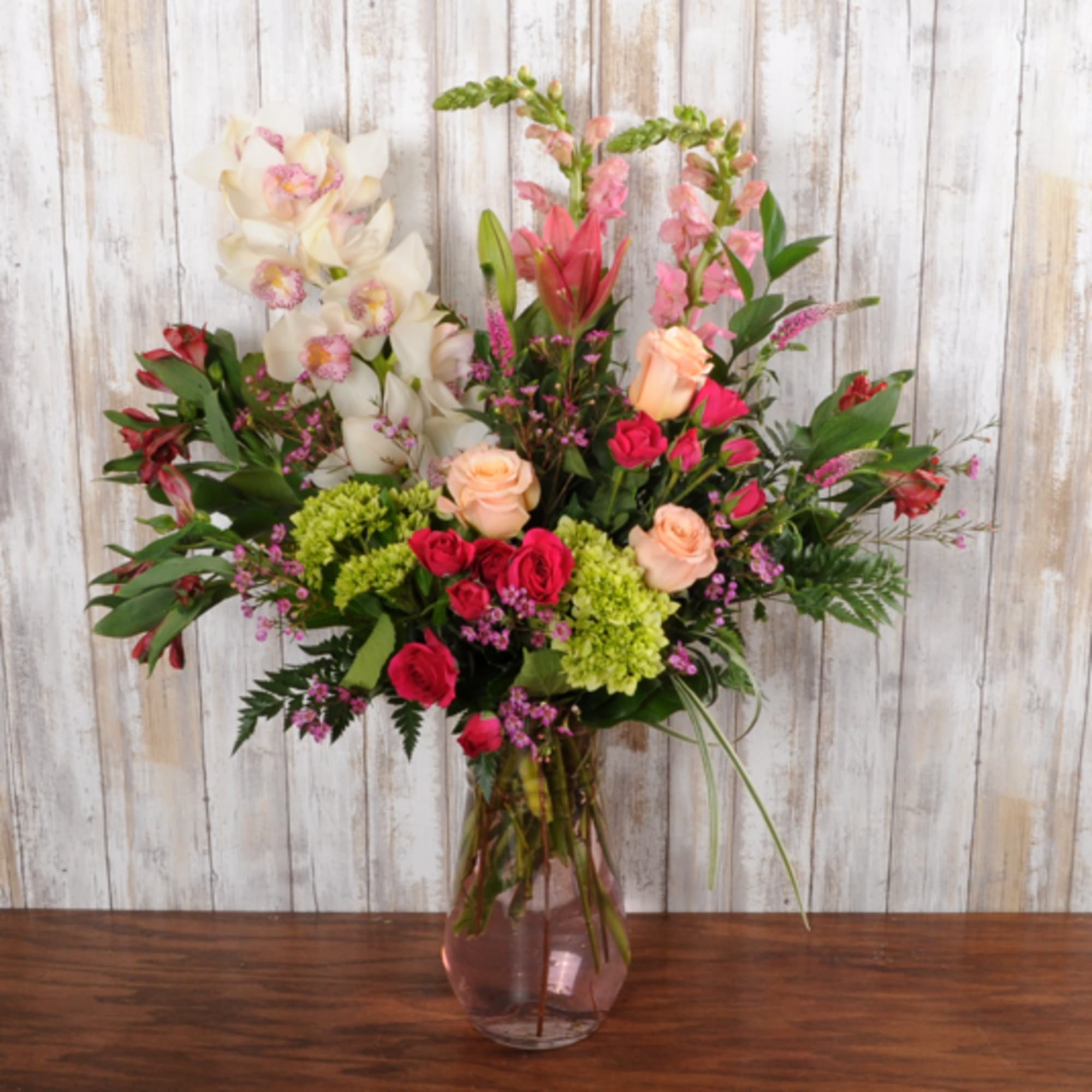 Amazing cymbidium orchid bloom adores this grand flower bouquet. 