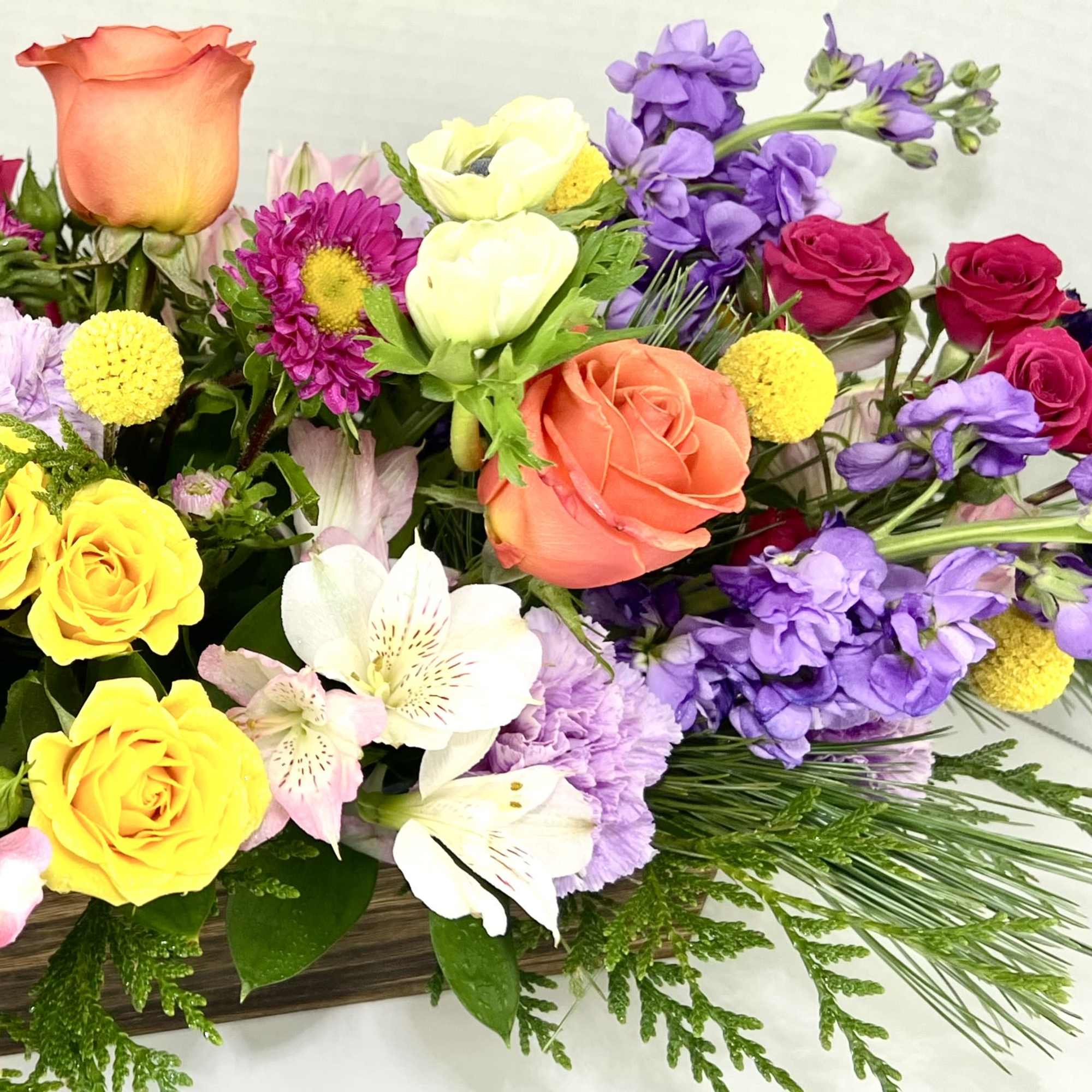 Keep things fun with this jewel toned flower box! Lots of saturated