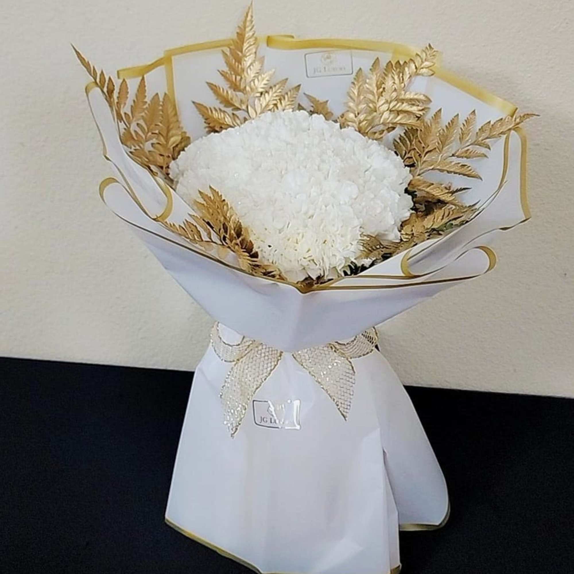 Standard 25 carnations.
Deluxe 50 carnations.
Premium 75 carnations.