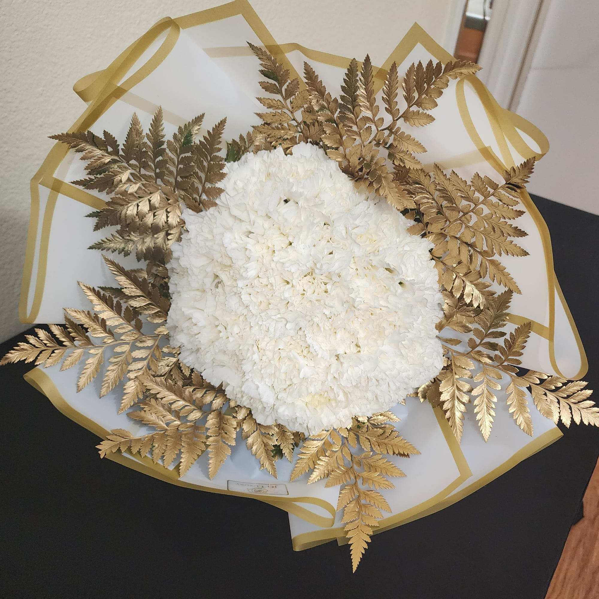 Standard 25 carnations.
Deluxe 50 carnations.
Premium 75 carnations.