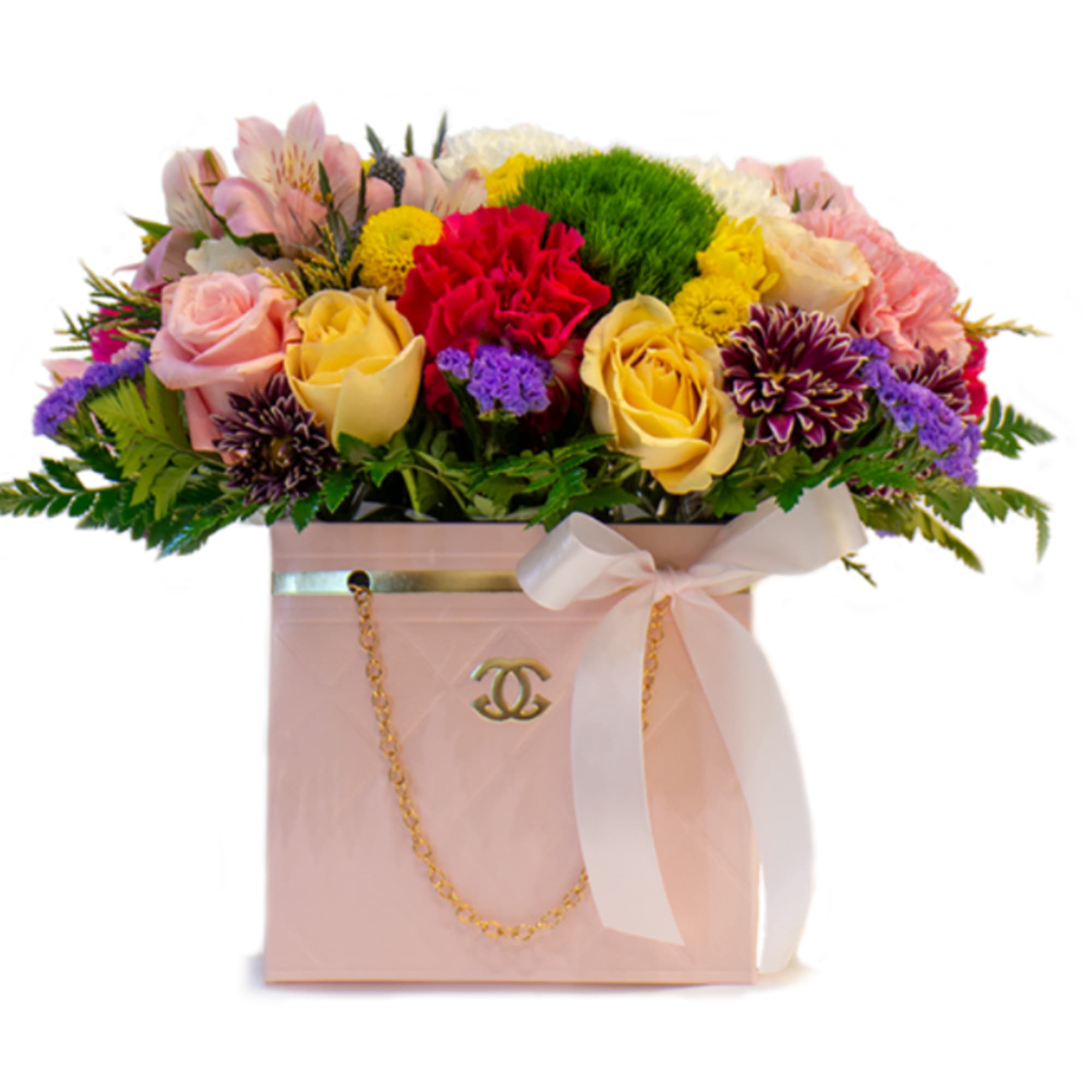 Medium Bag arrangement filled with Ecuadorian roses and fillers.