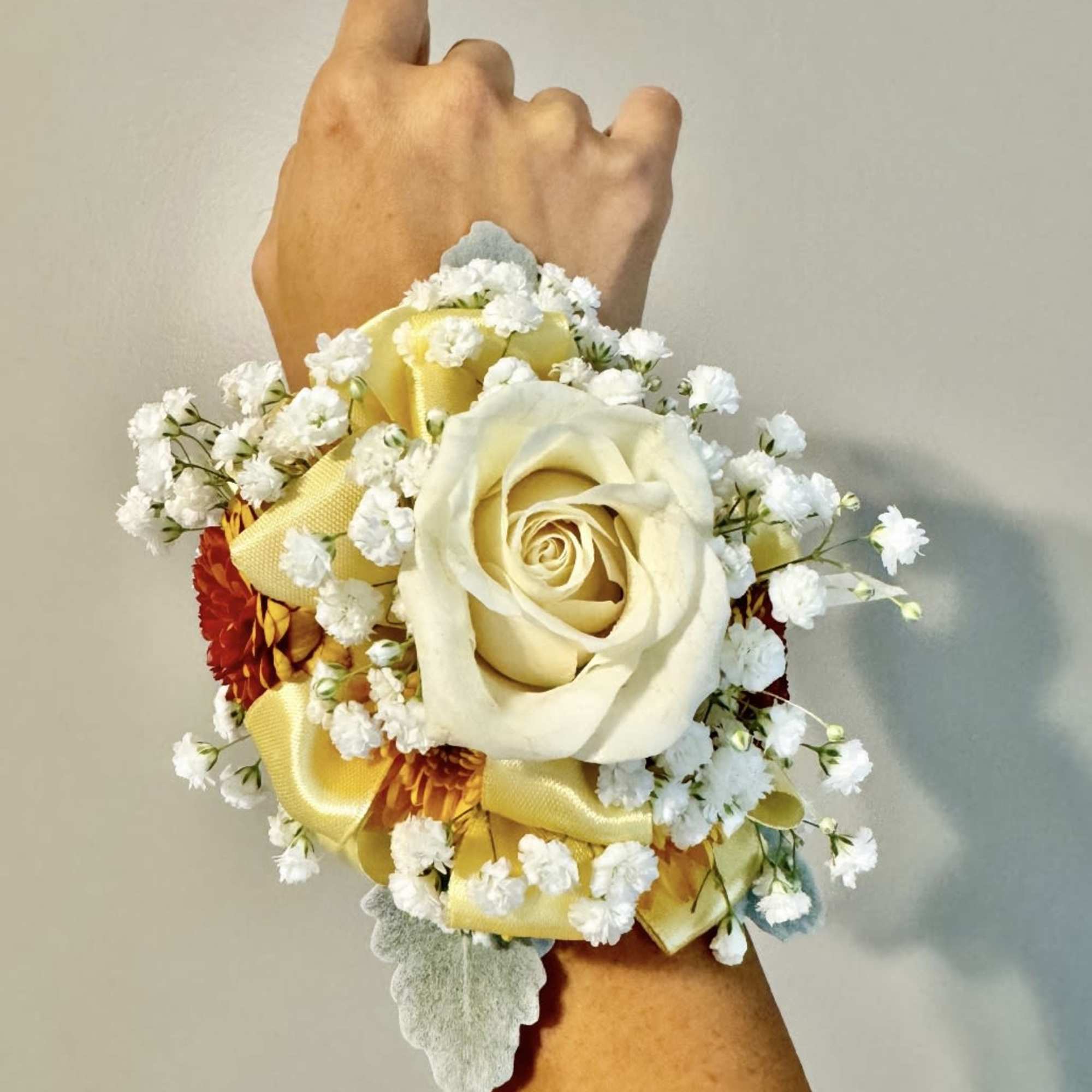 A youthful and elegant design especially created by the Florist. Flowers are