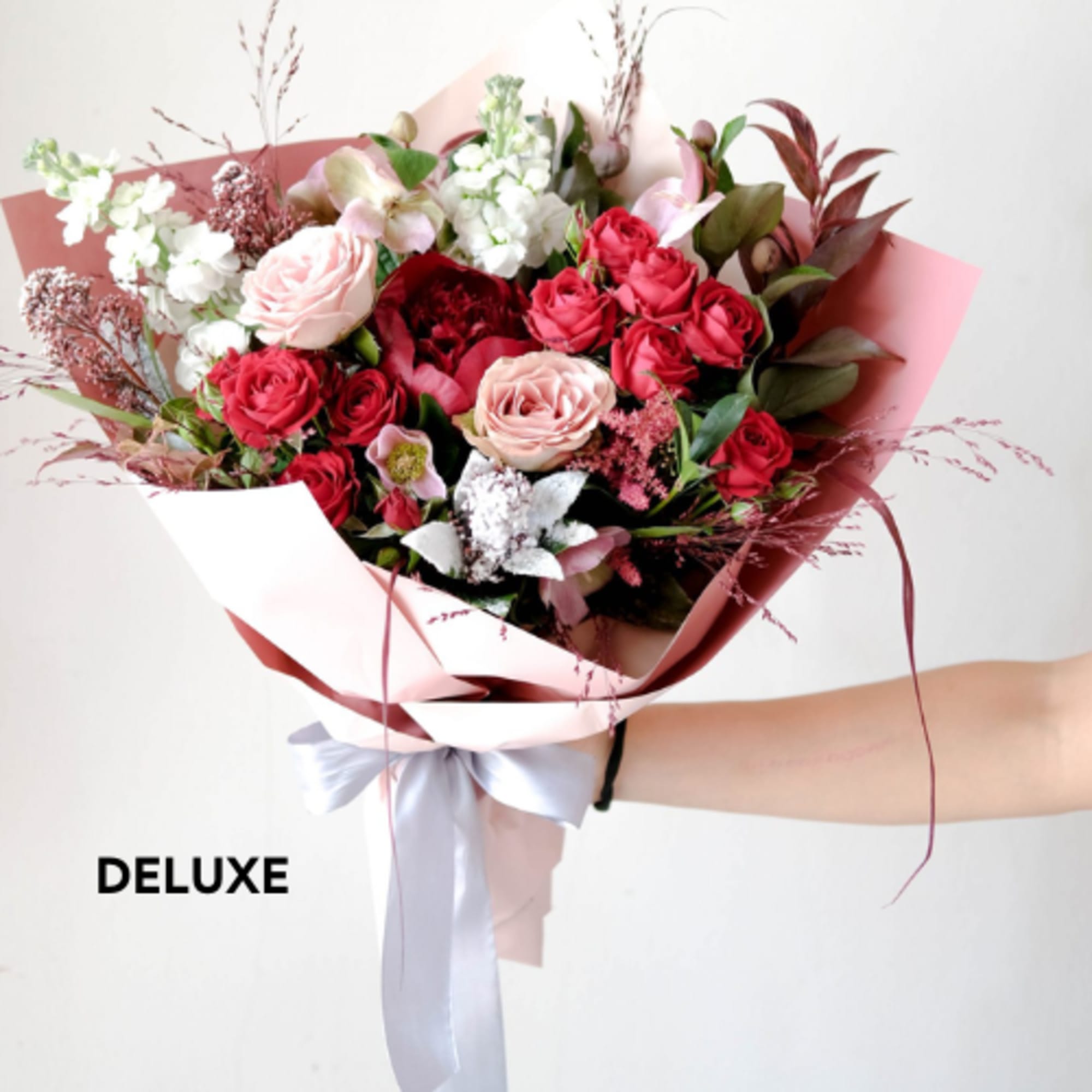 Designer's Choice - A selection of Valentine's Day mix of florist choice