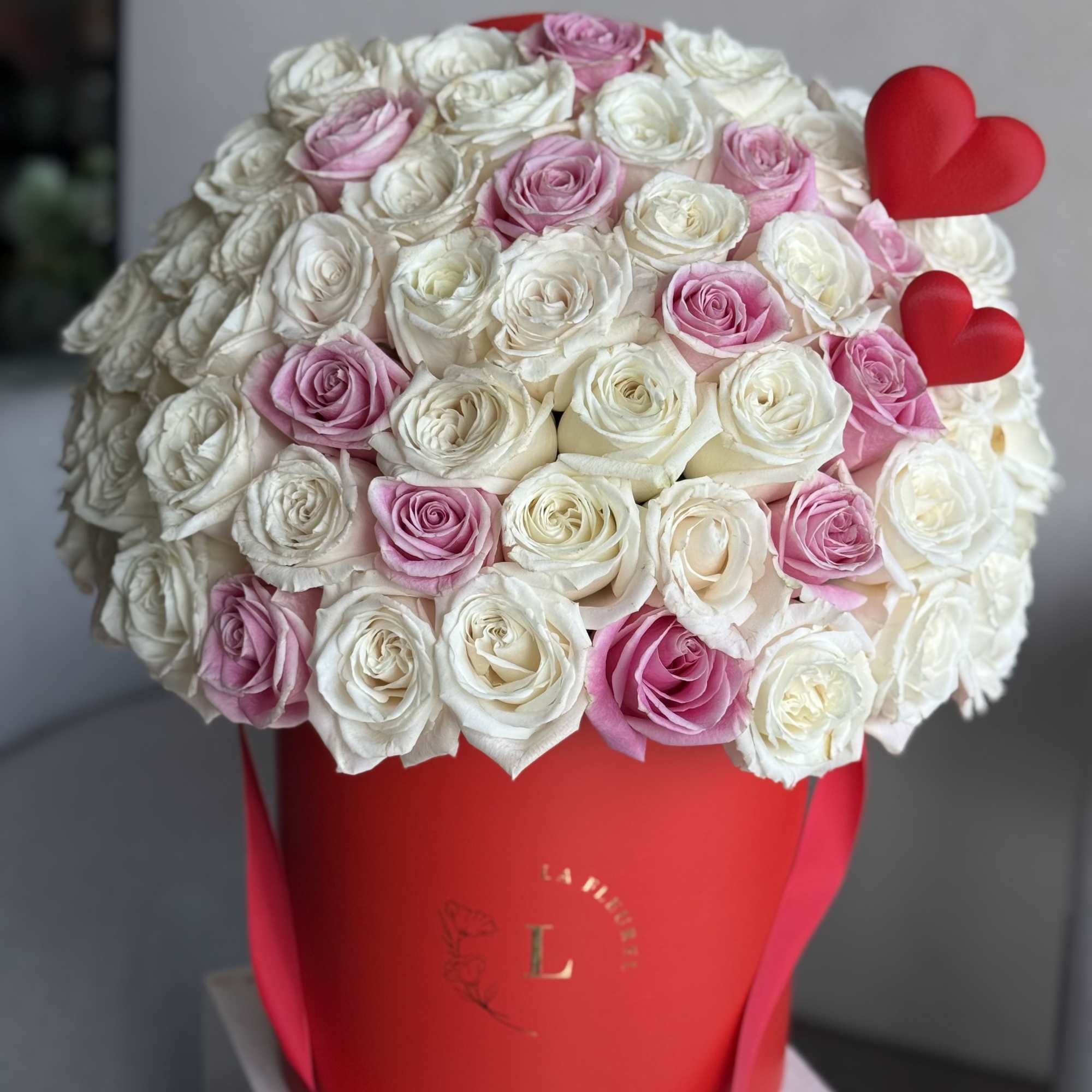 This beautiful arrangement filled with the white and pink roses to deliver