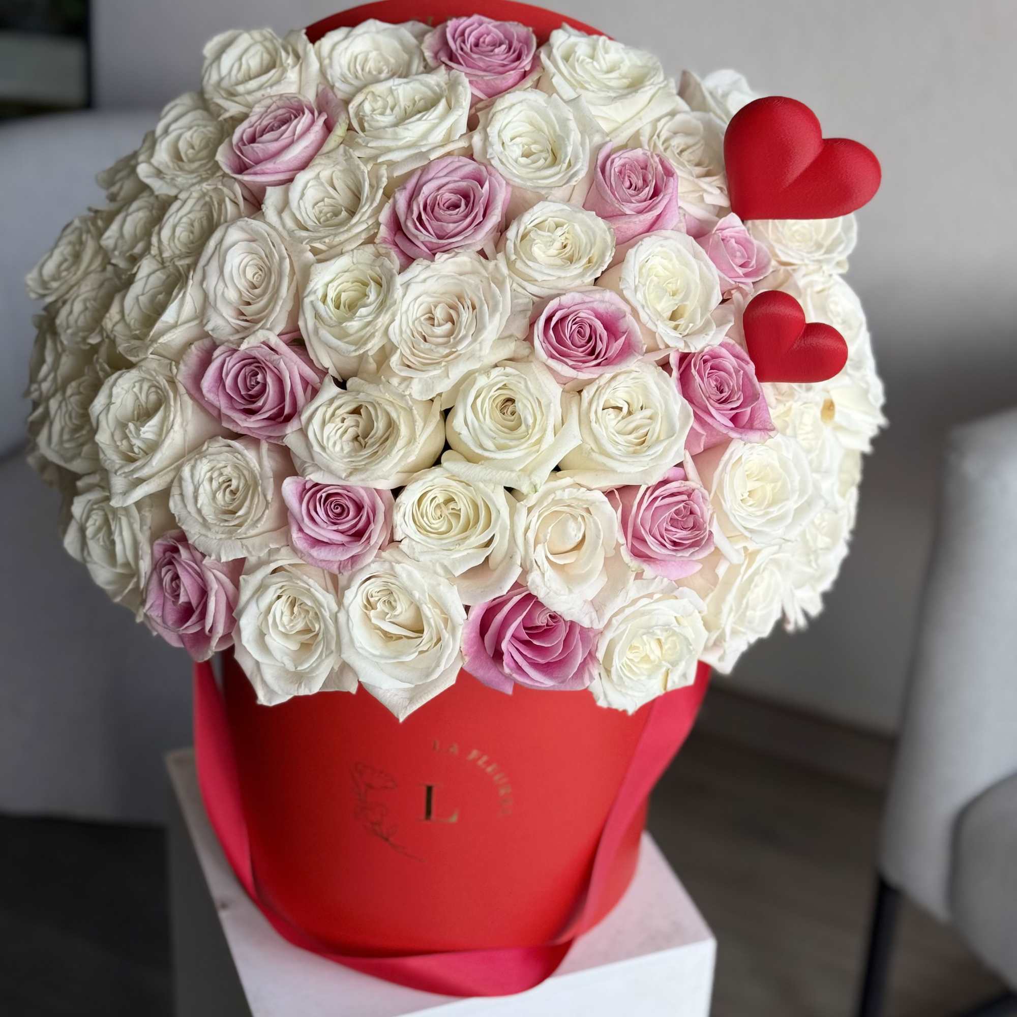 This beautiful arrangement filled with the white and pink roses to deliver