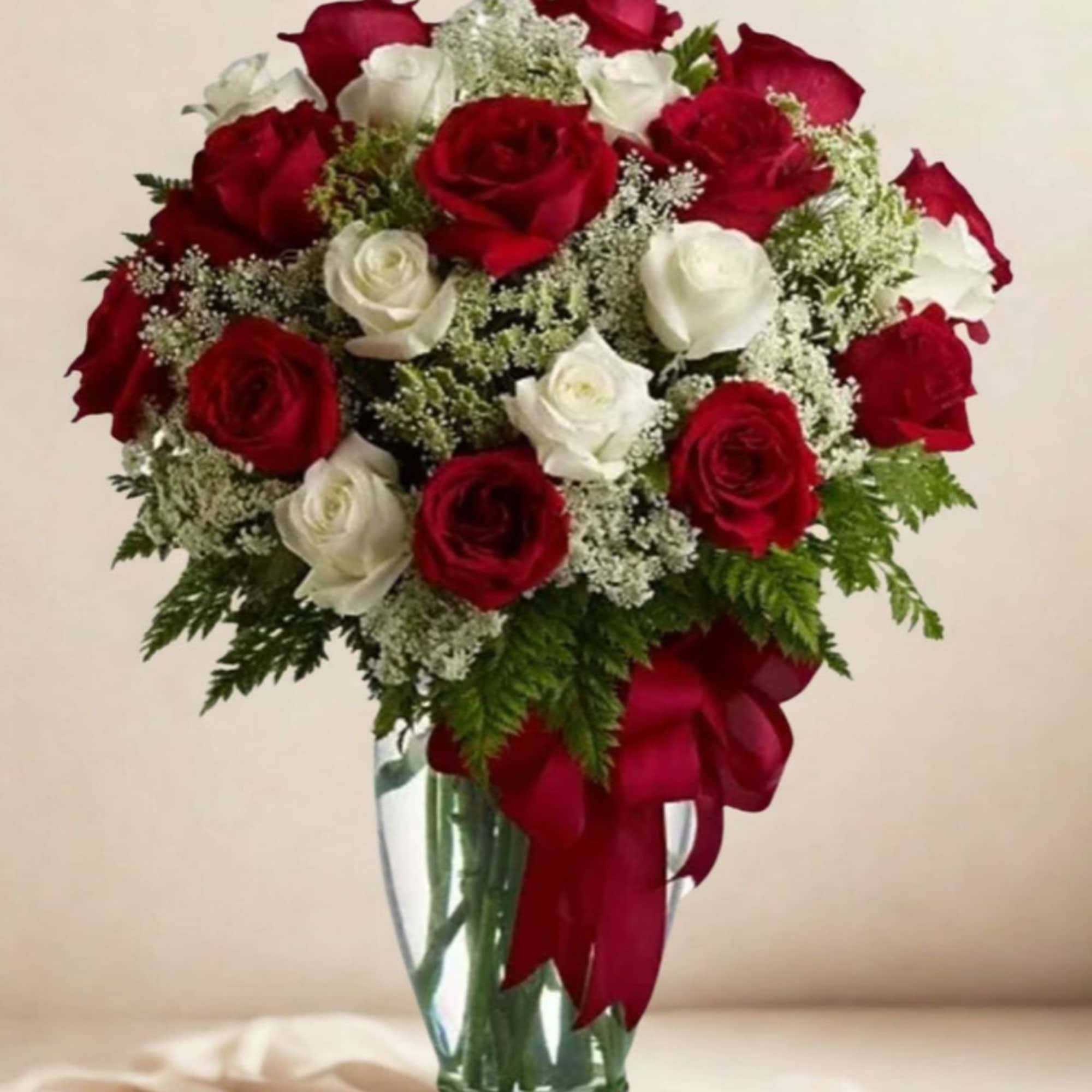 A very elegant display of roses in a clear vase to show