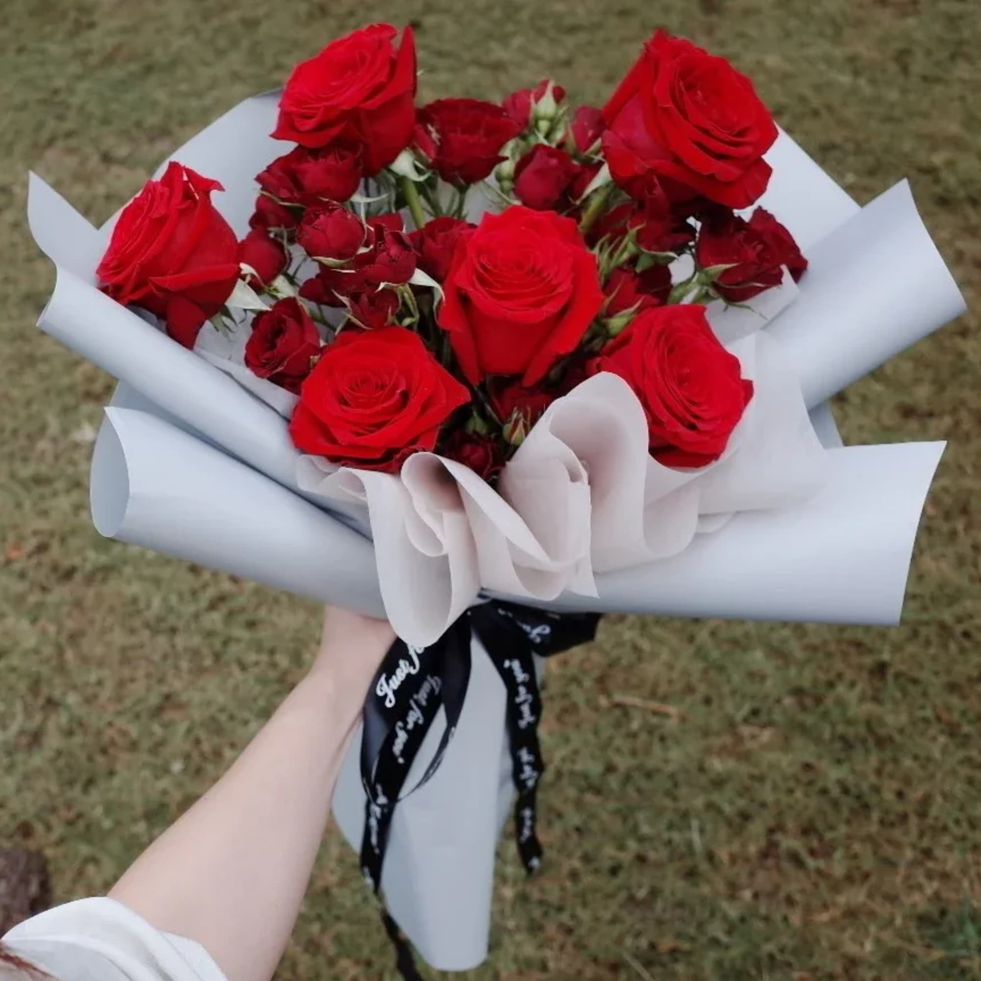 Bold expression of love with a modern twist. This bouquet features fresh