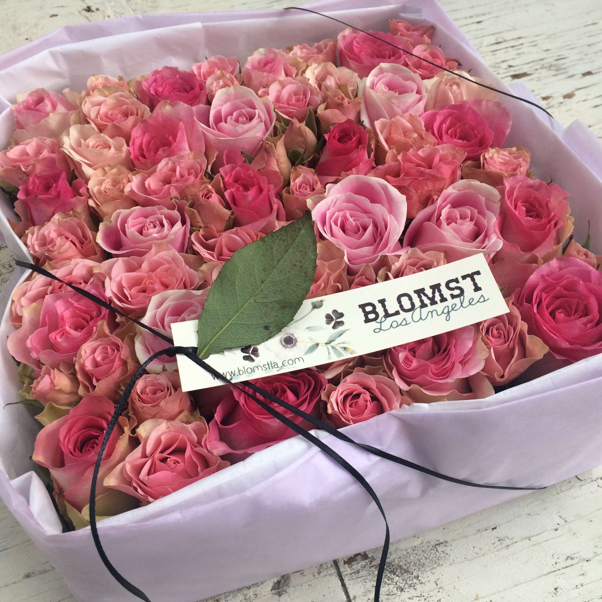 A beautiful signature Blomst rose box packed with pink and light pink