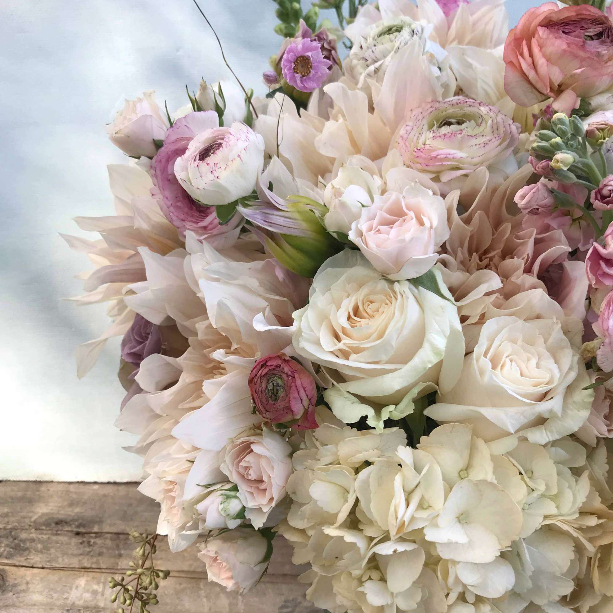 Extravagant yet bohemian large arrangement of powder pastel colors and feminine, soft