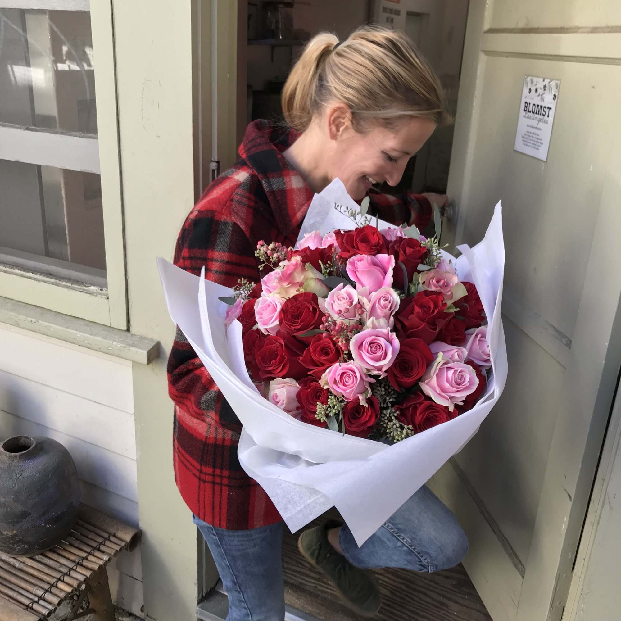Pretty jewel tones in this gorgeous Rose bouquet packed with the freshest