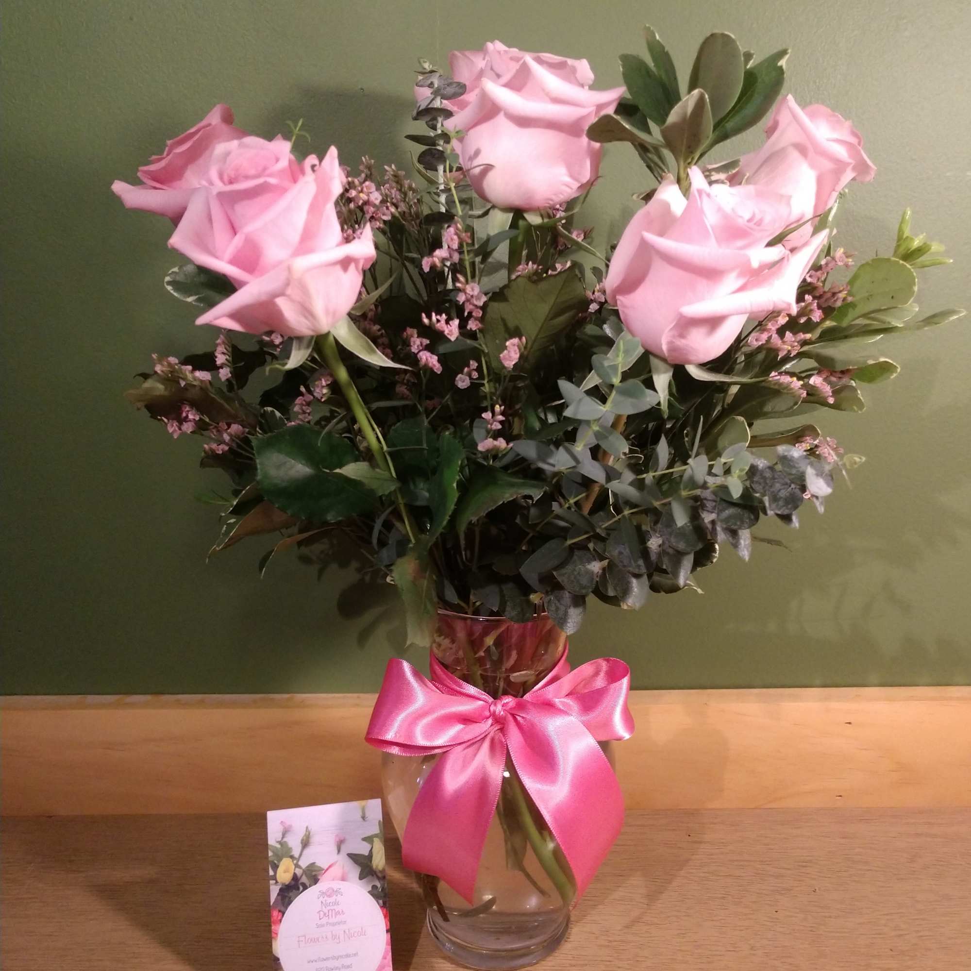 Say it sweeter with this feminine bouquet of pink roses and lush