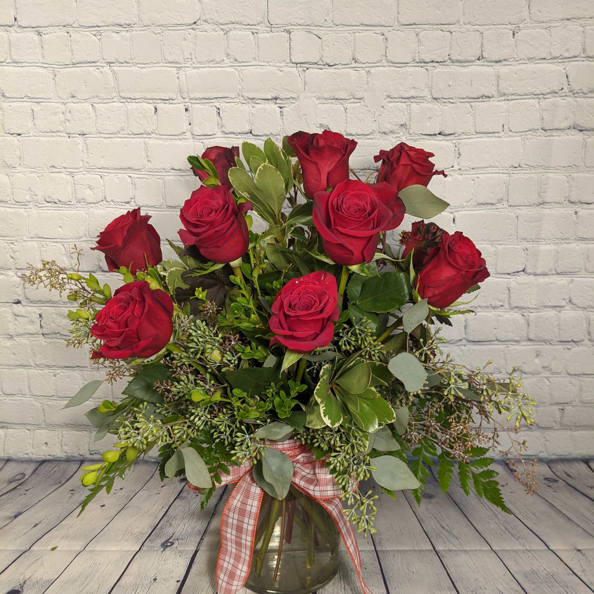 Nothing compares to the timeless beauty of a dozen long-stemmed red roses.