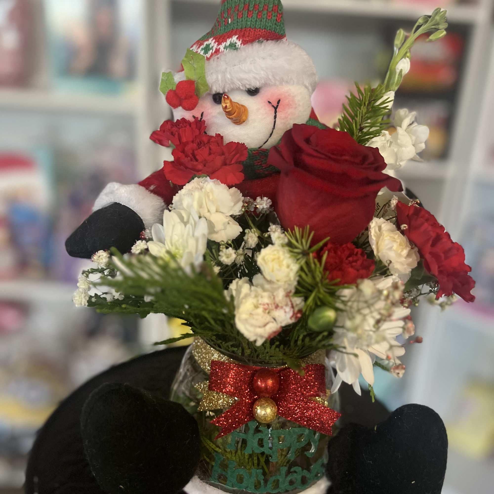 fresh floral in snow man container 