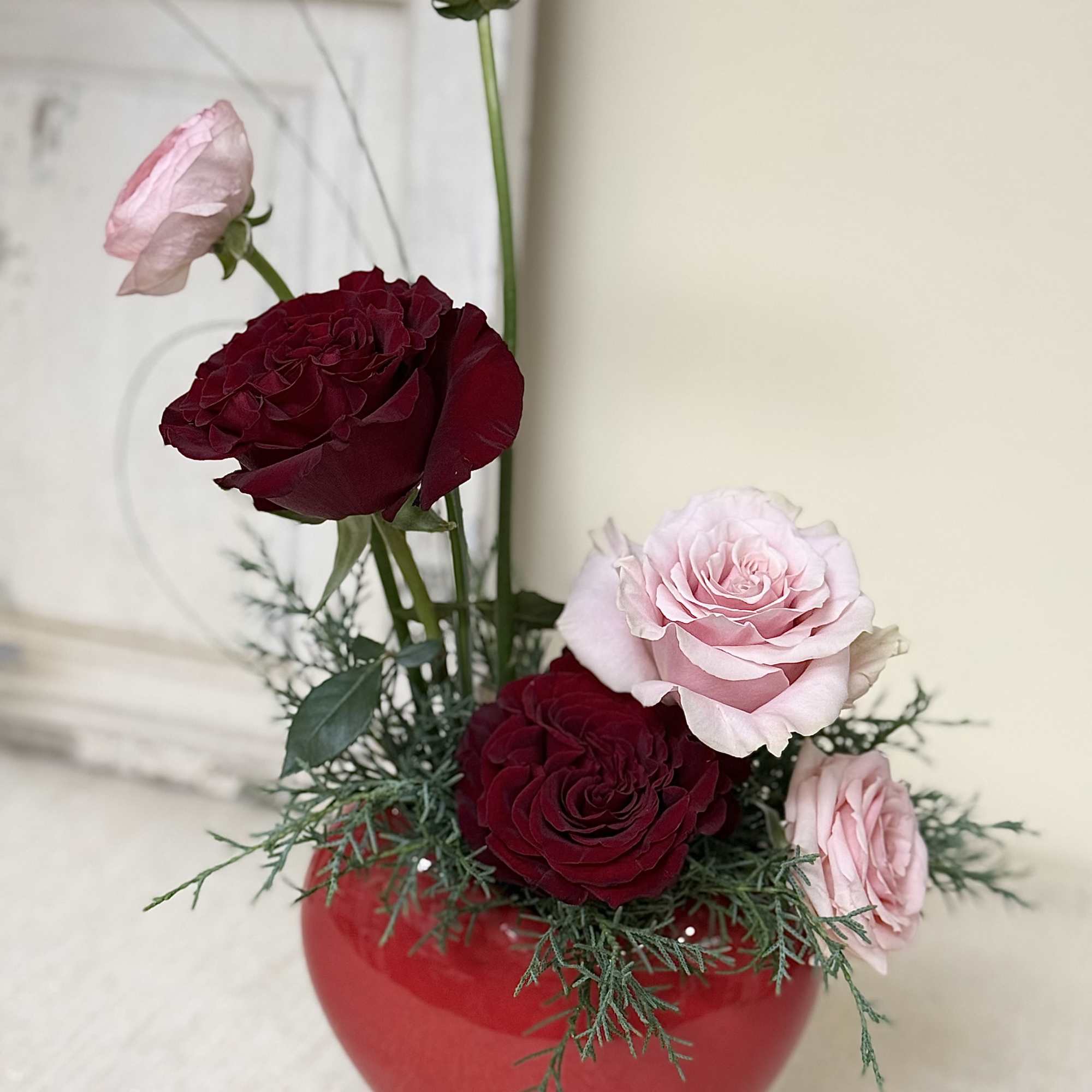 A modern design in a beautiful red heart vase to express your