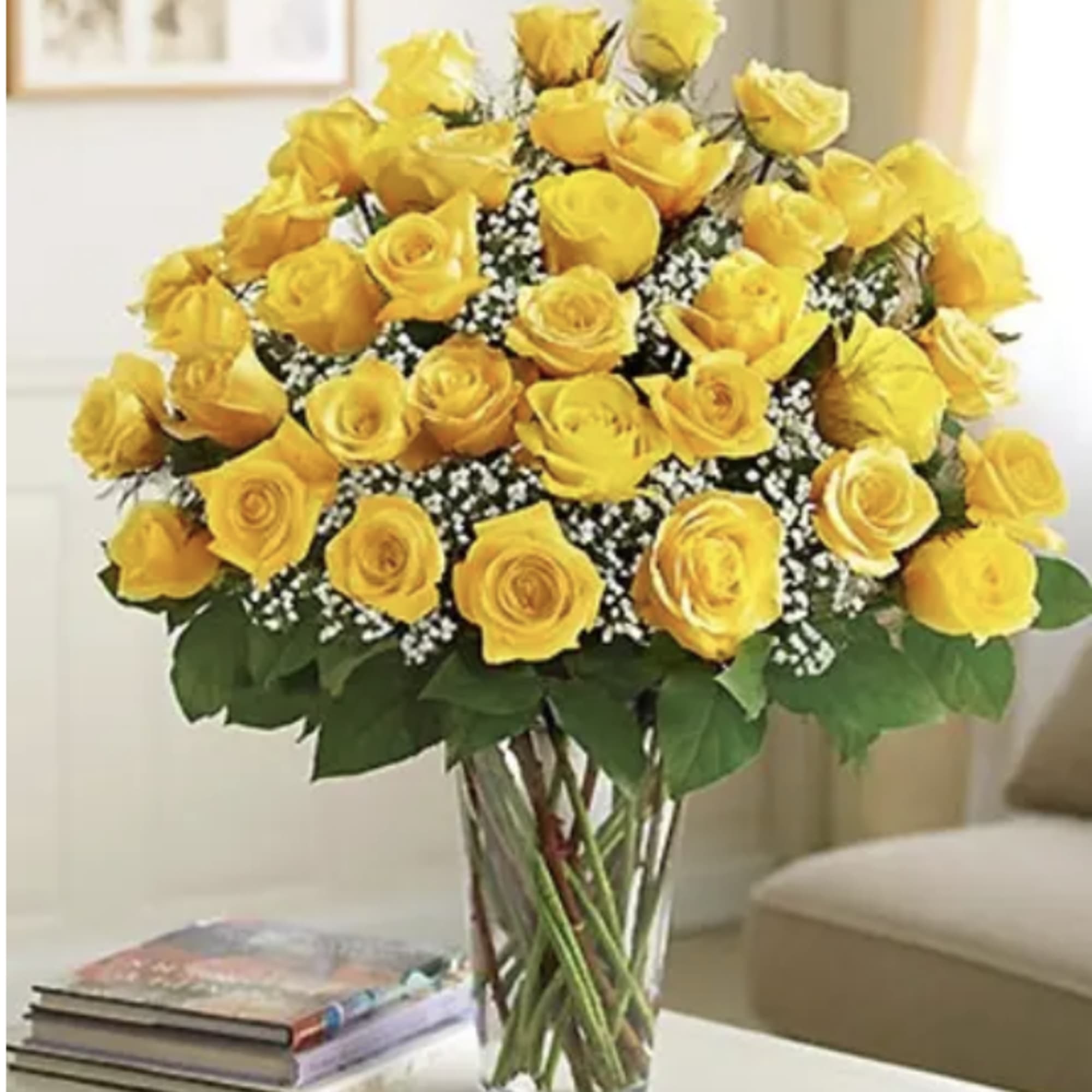 A dozen gorgeous yellow roses are the perfect romantic gift to send