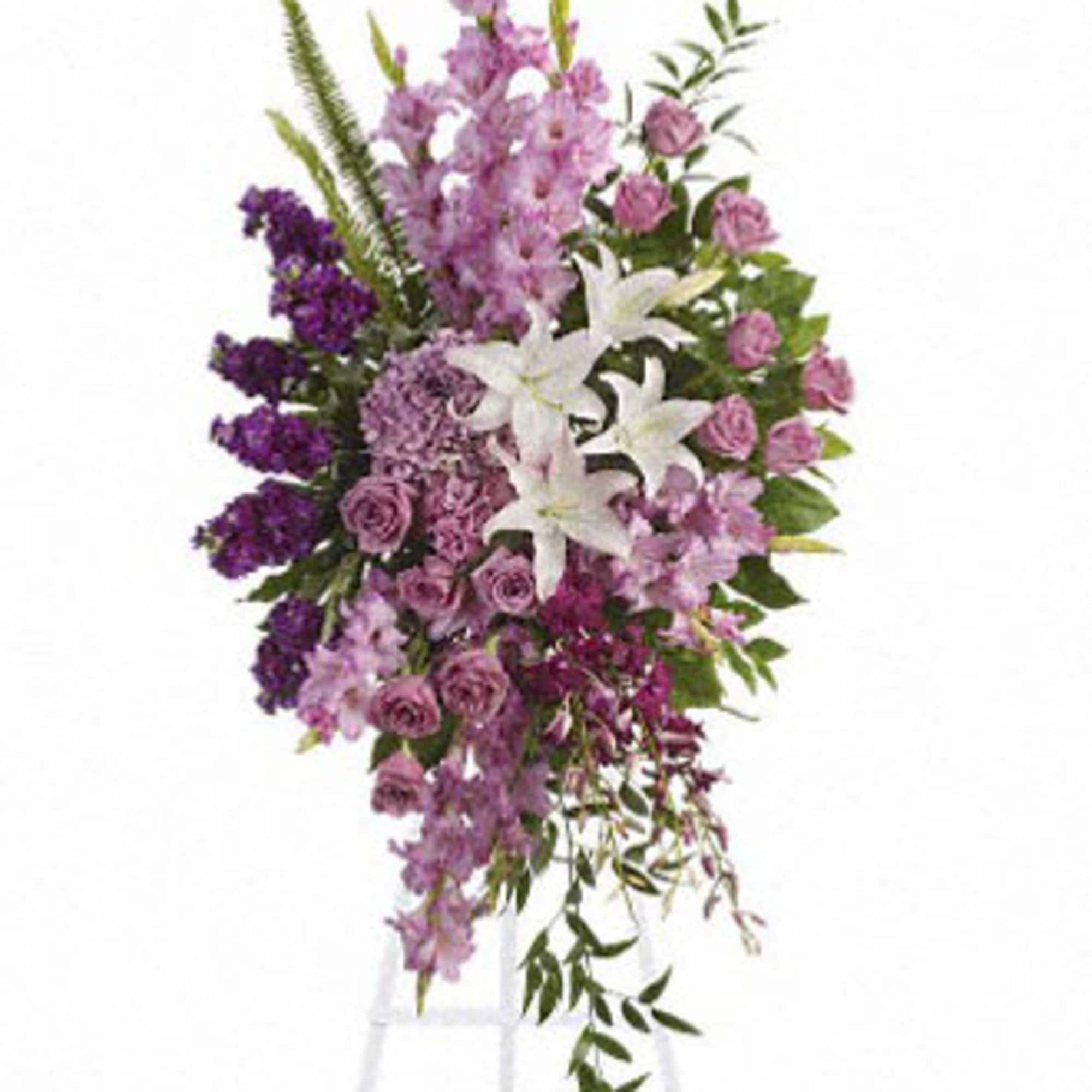 Peaceful blooms such as lavender roses, gladioli and hydrangea, with purple orchids