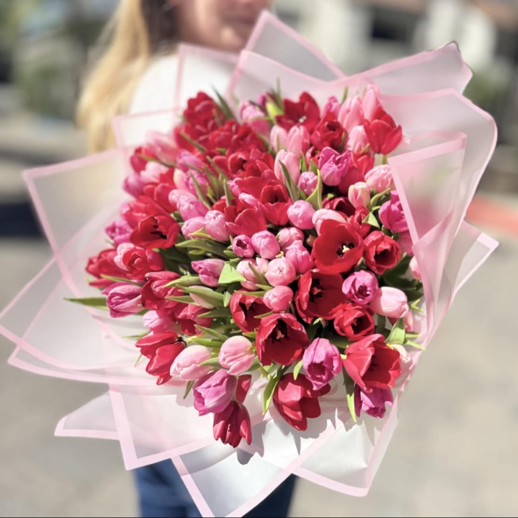 Indulge in pure floral luxury with our breathtaking bouquet of 100 pink