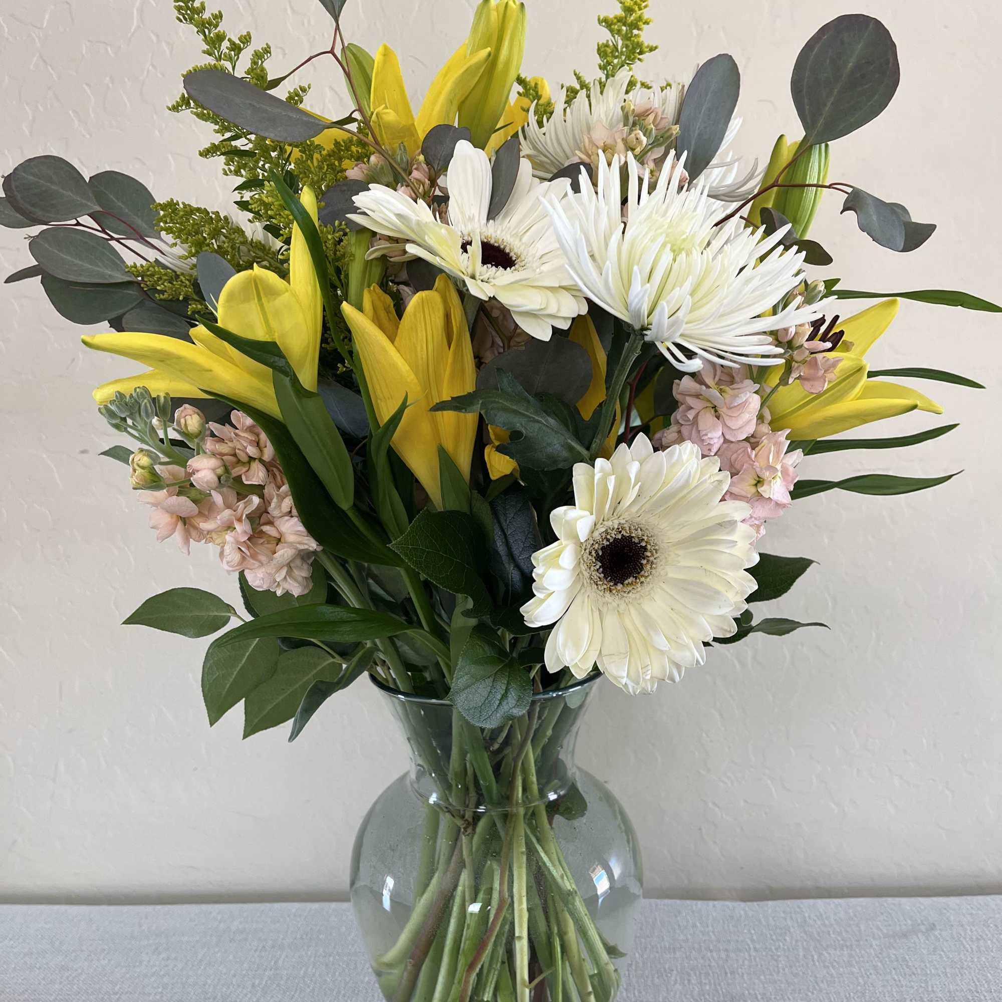 Send some sweet and warmth with this vibrant bouquet!  combines wonderful