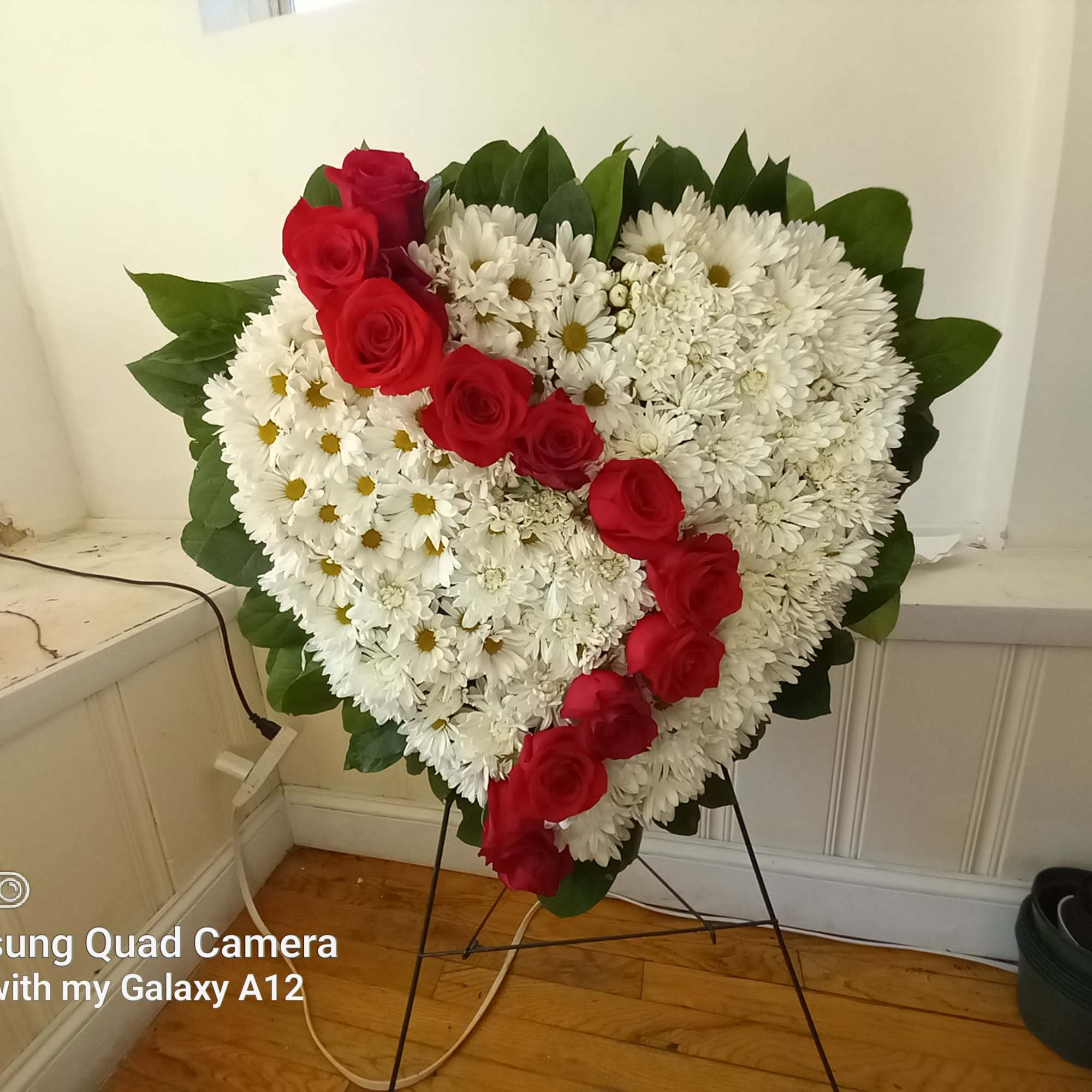 White daisies and red roses heart shaped standing spray  