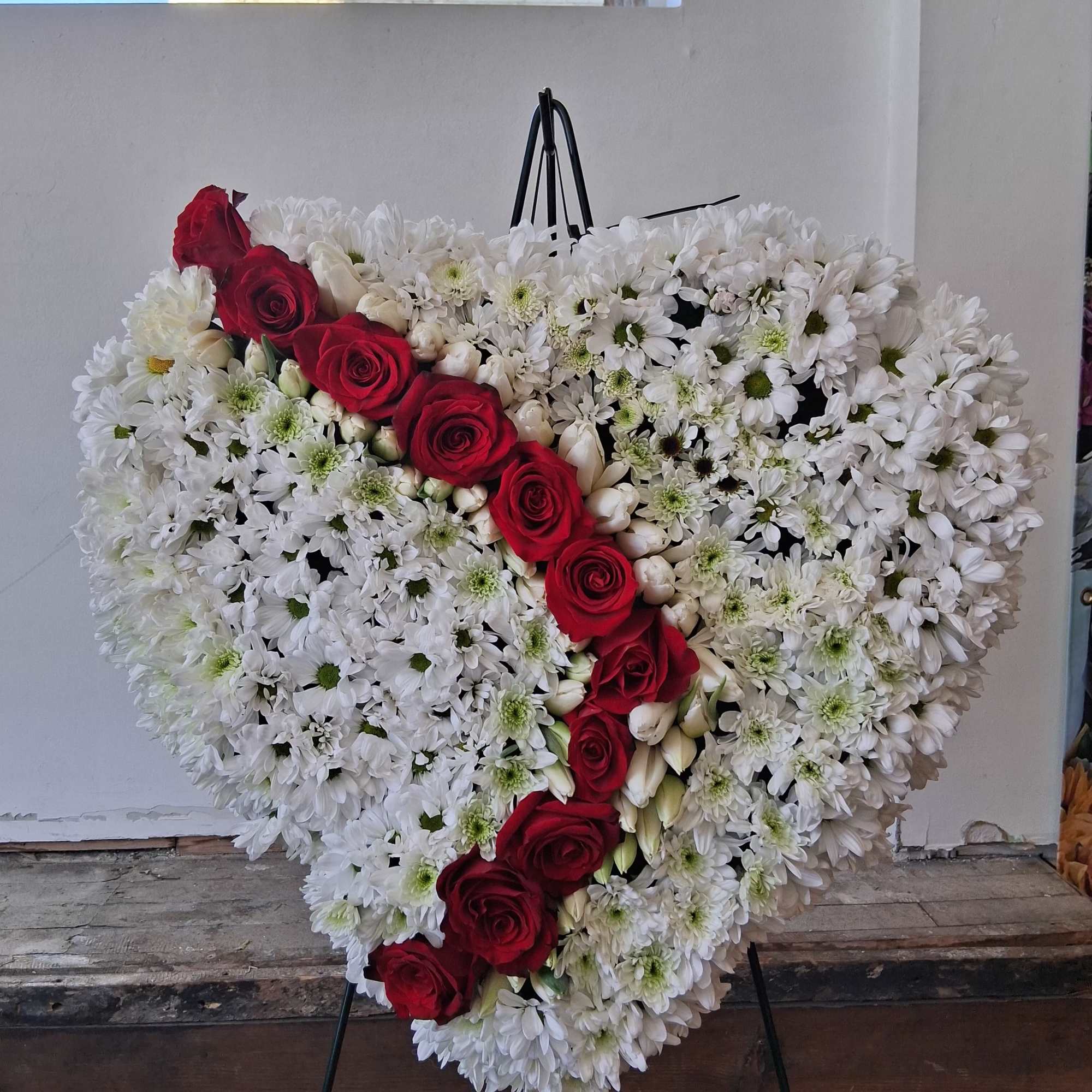 White daisies and red roses heart shaped standing spray  