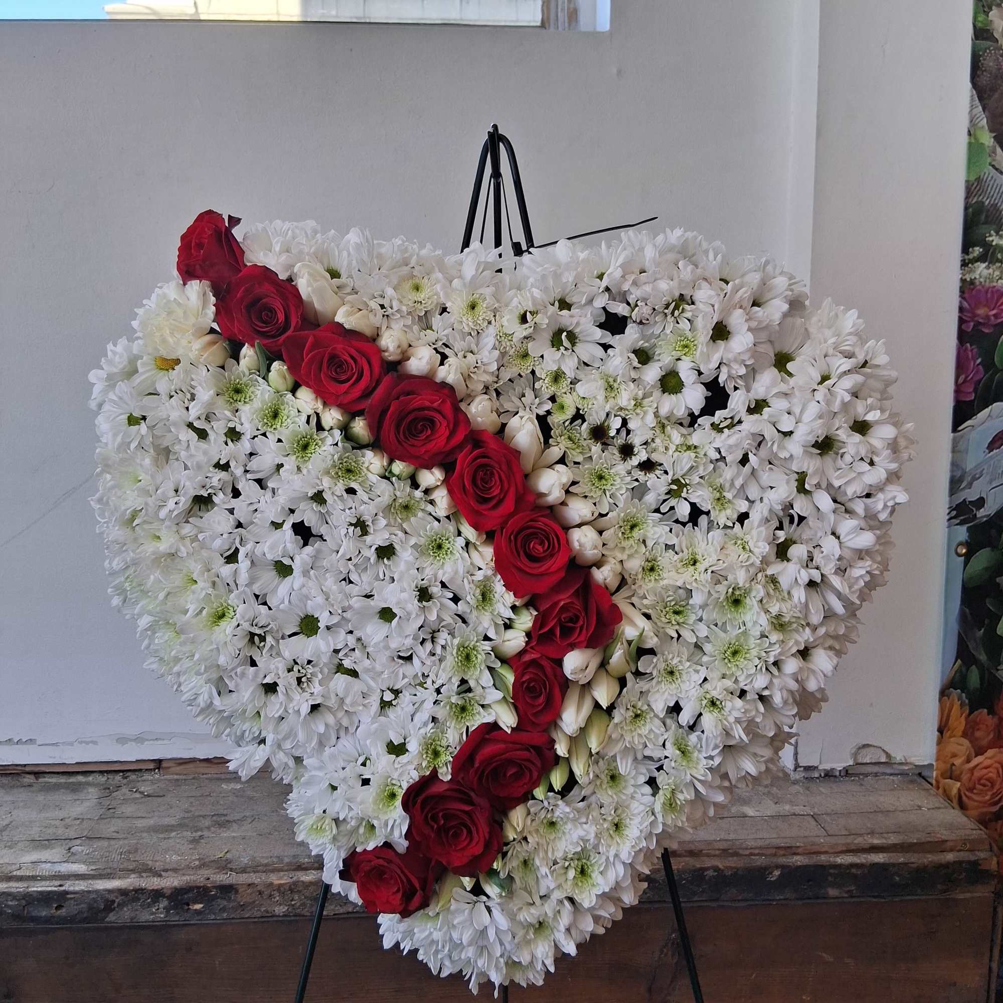 White daisies and red roses heart shaped standing spray  
