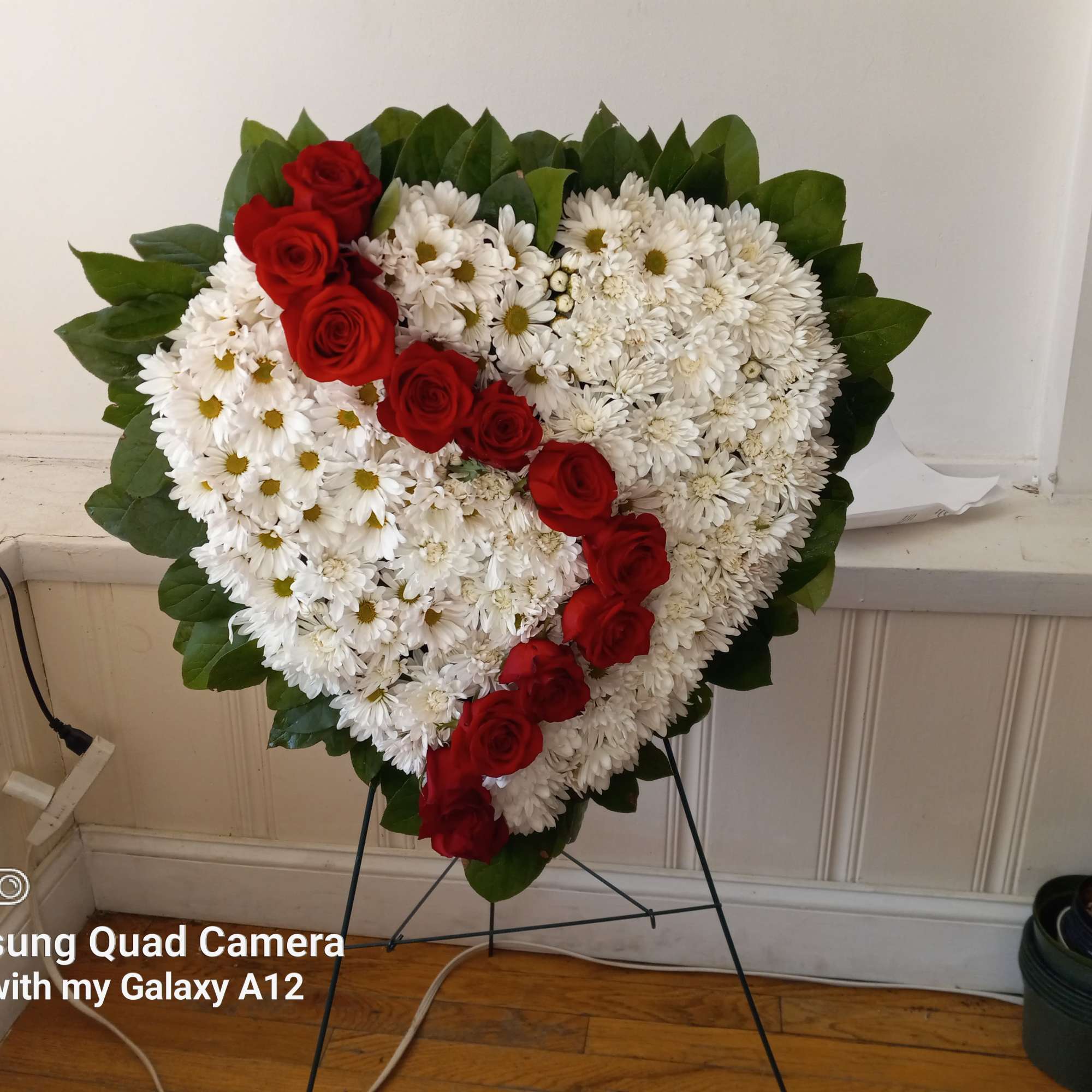 White daisies and red roses heart shaped standing spray  