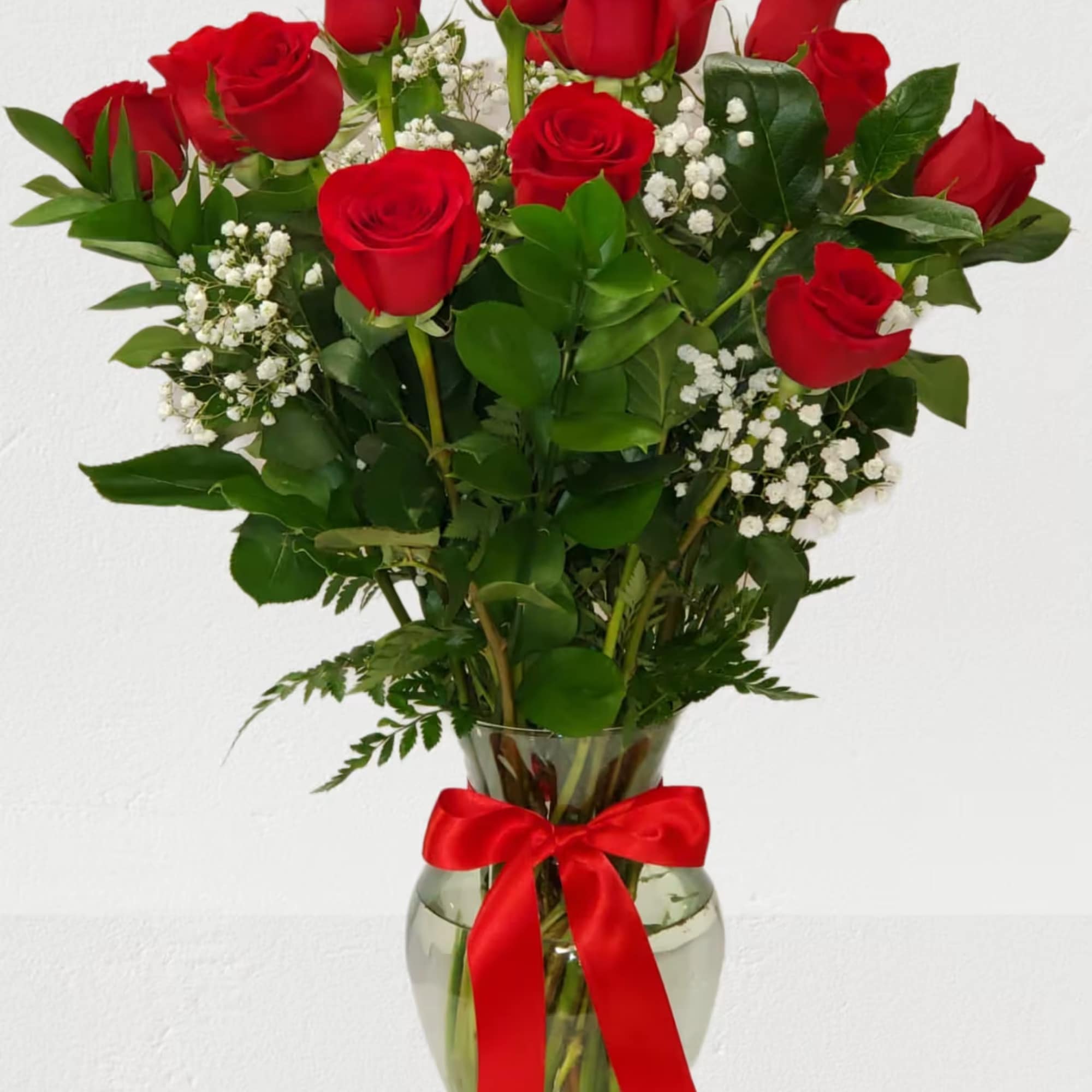 Red Rose's in a vase always make someone happy they came in