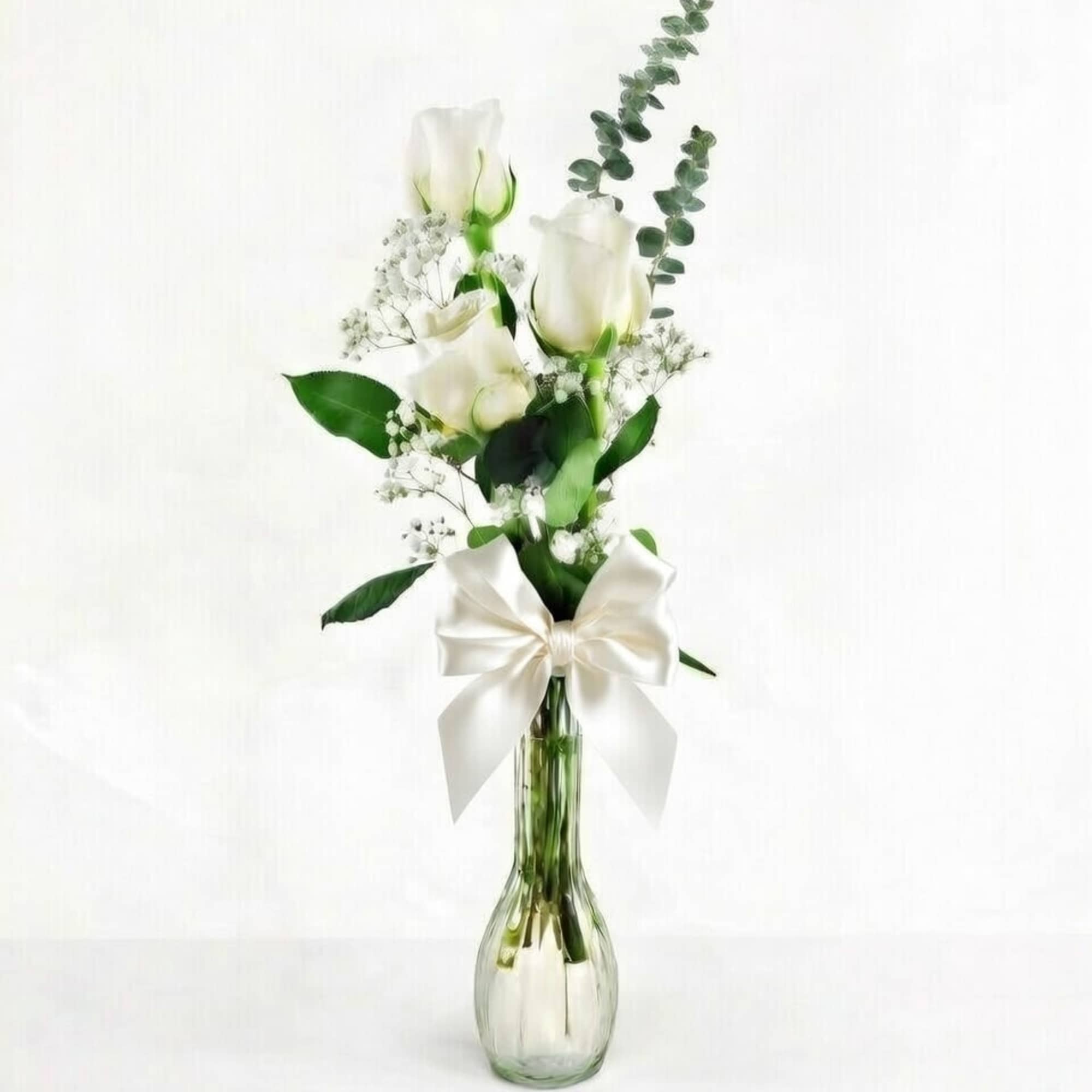 A perfect expression of understated elegance, this charming arrangement features three premium