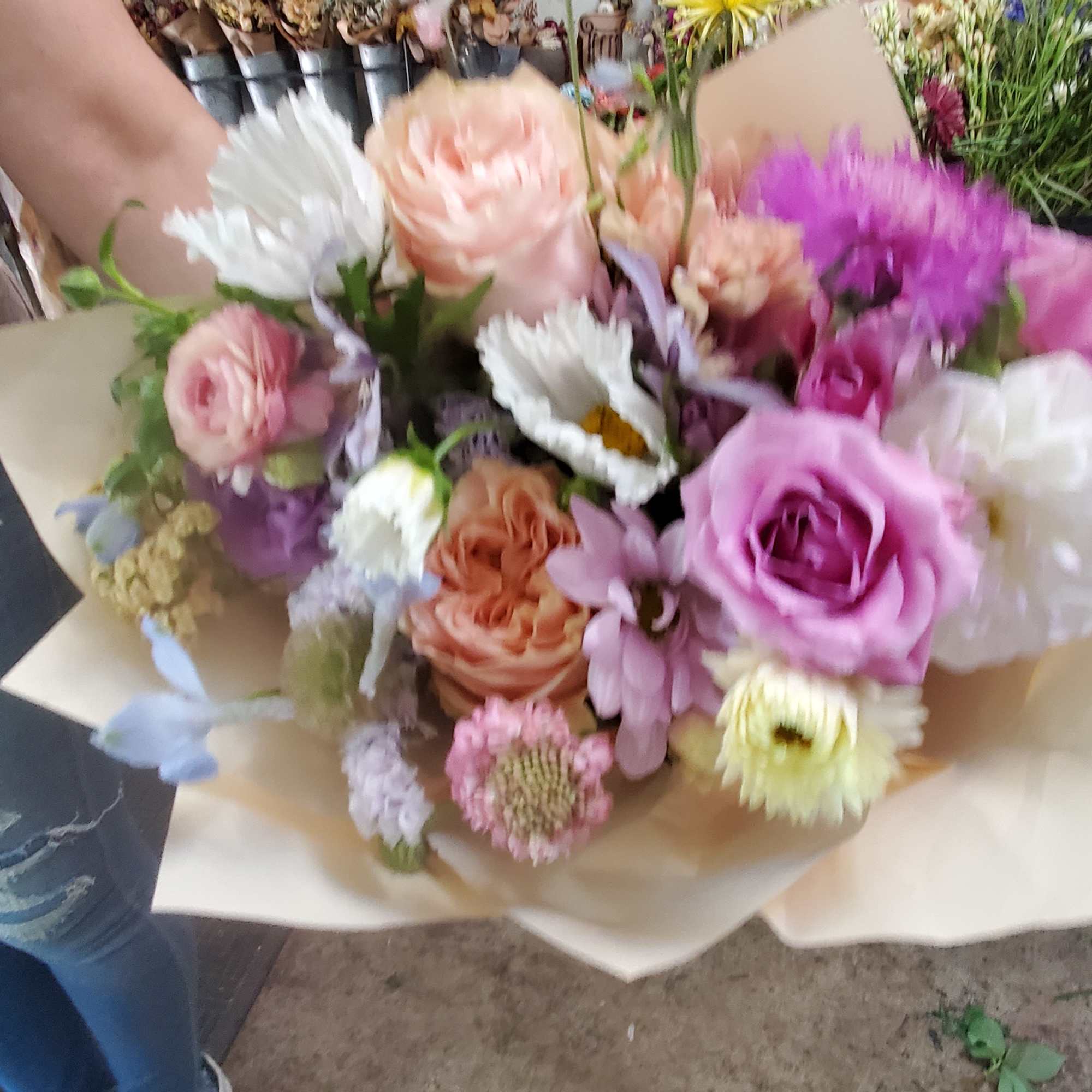 Handwrapped bouquet with high end flowers. Various color scheme