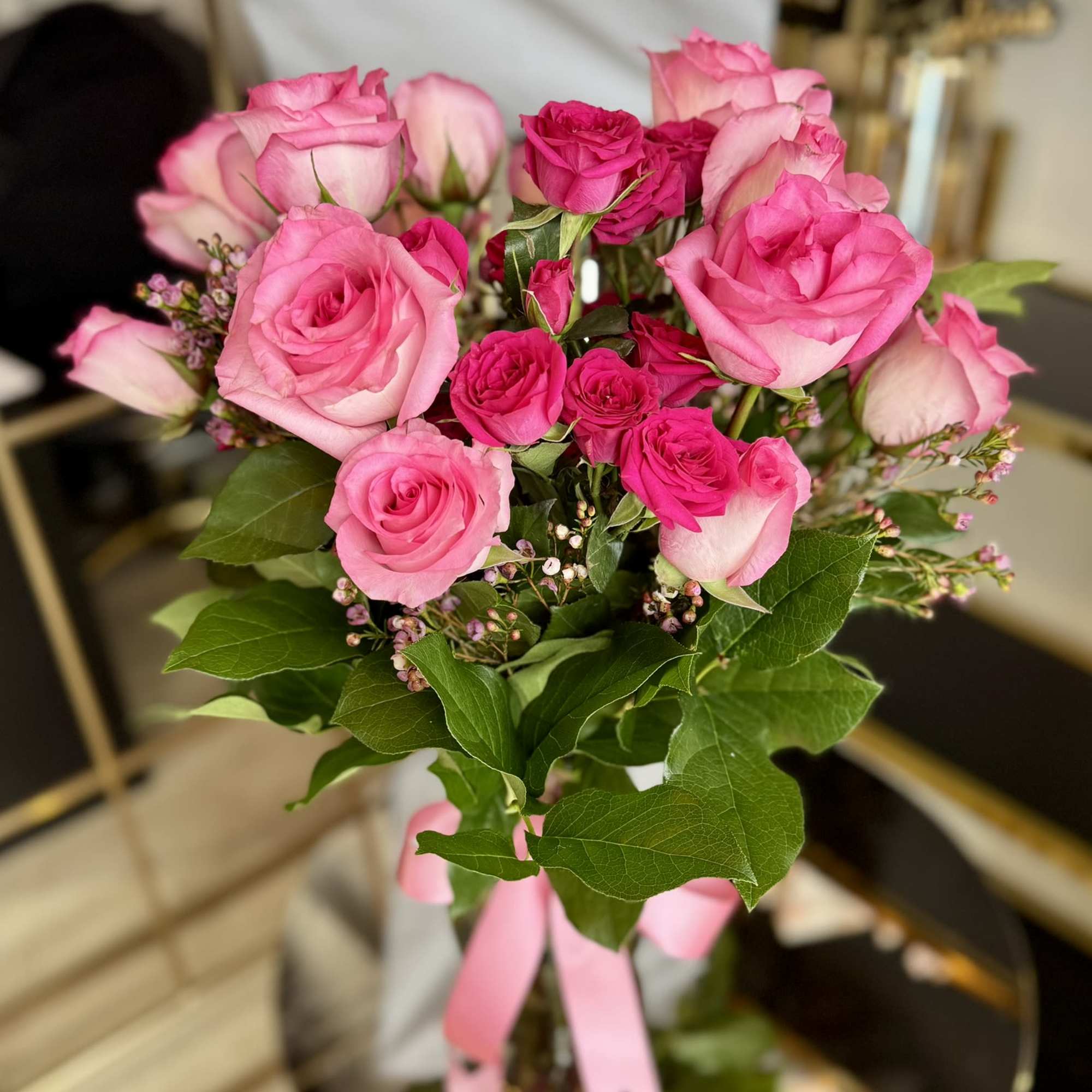 A vibrant and romantic arrangement featuring a stunning mix of soft pink