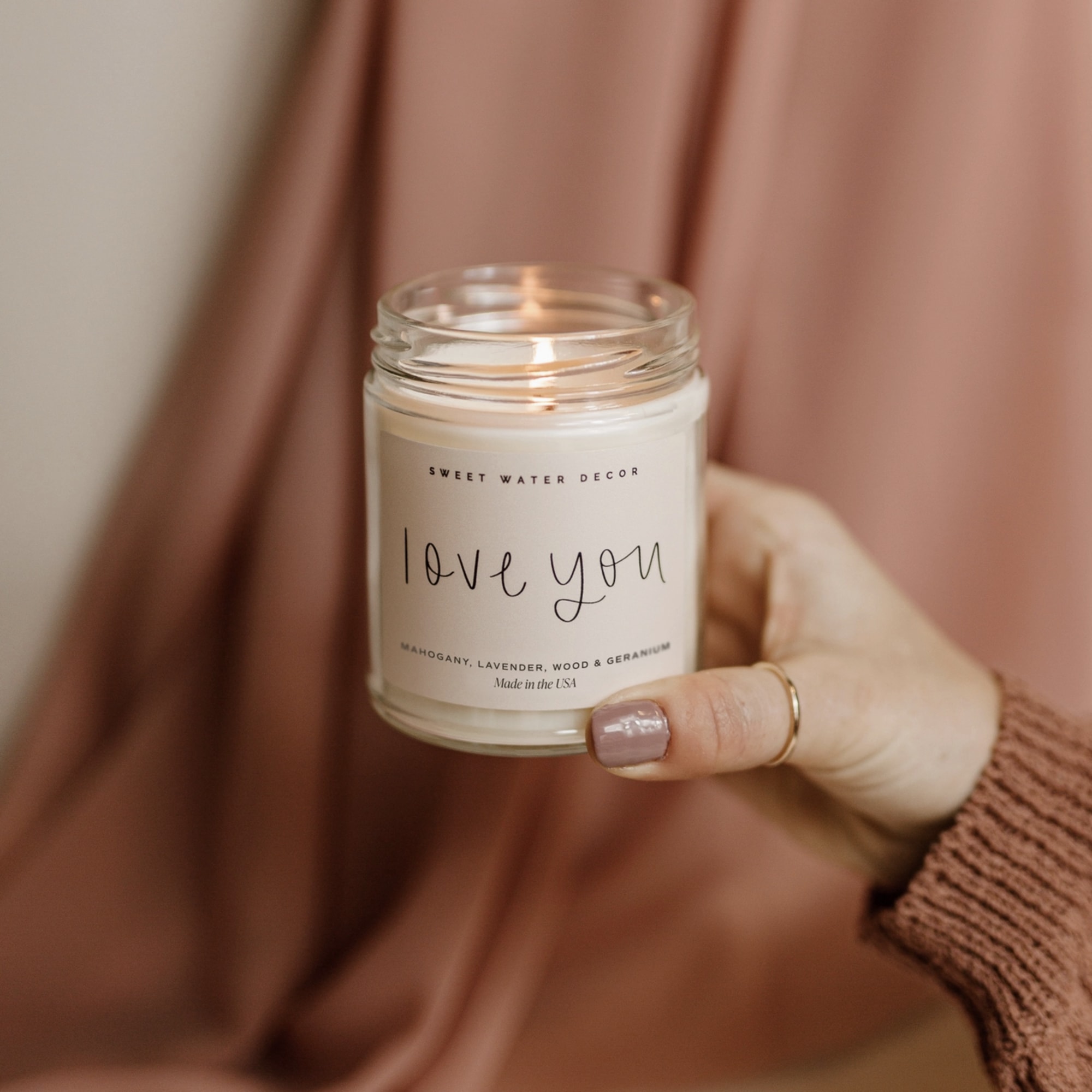 Celebrate love with our Love You candle, a warm and inviting blend
