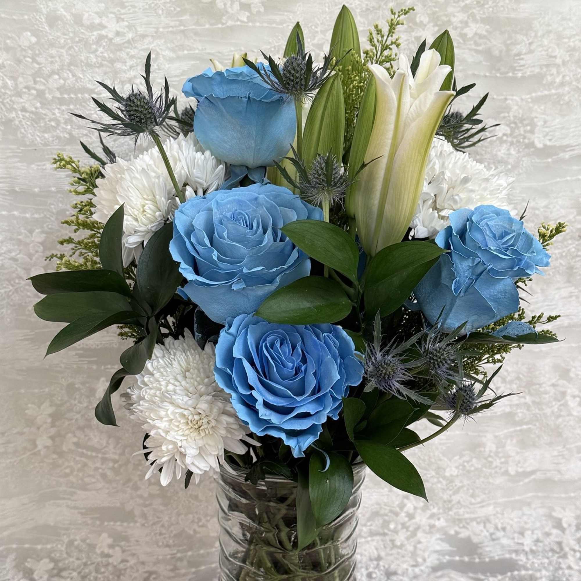 light blue and white flower arrangement