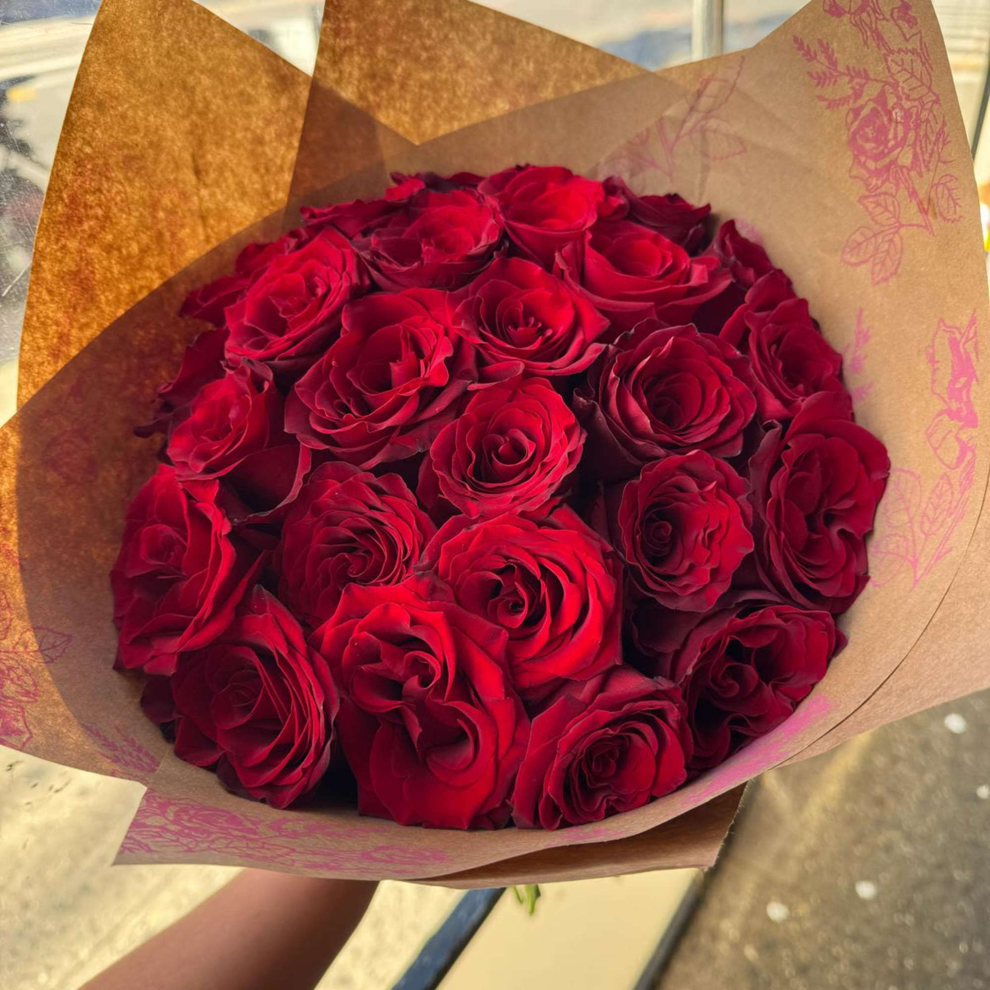 A stunning bouquet of 35 red roses. Colors of roses and Korean