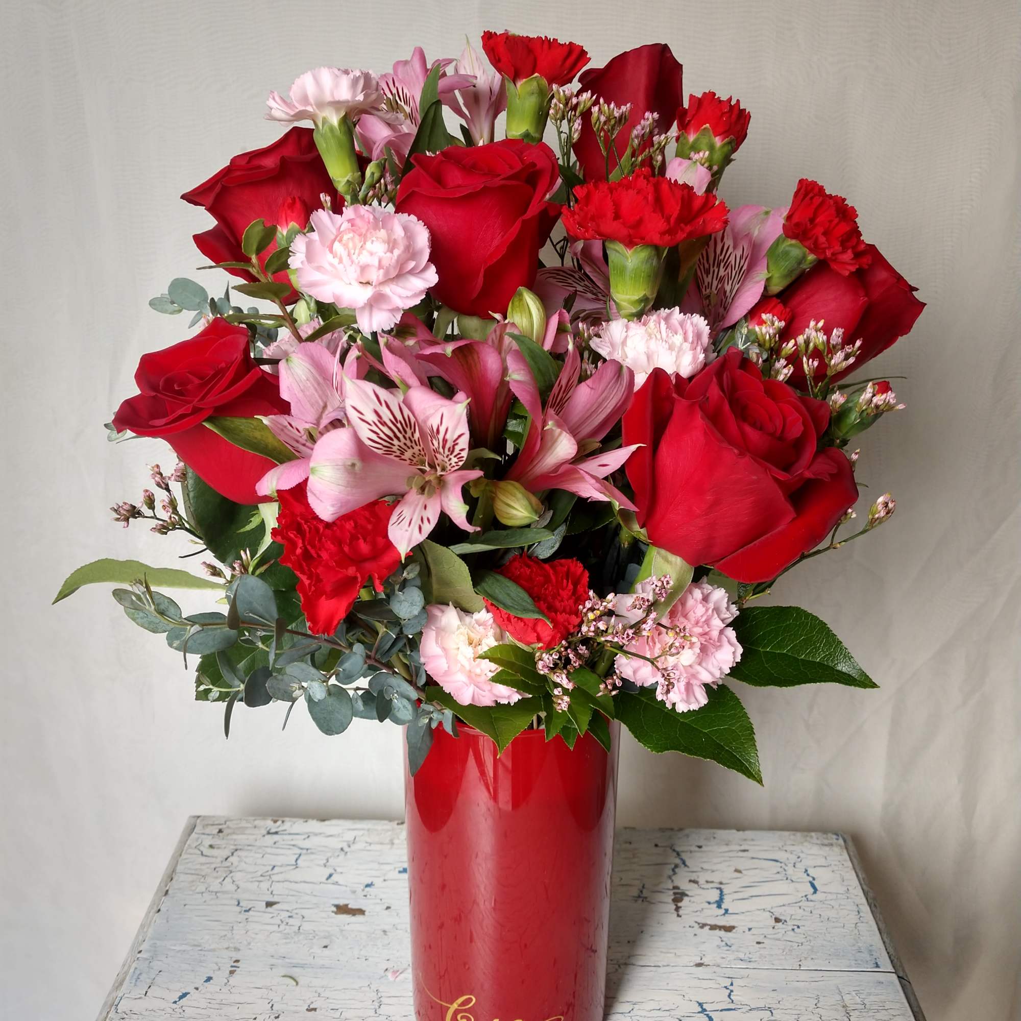 Sweet and romantic mix of alstroemeria, roses and carnations with assorted greens