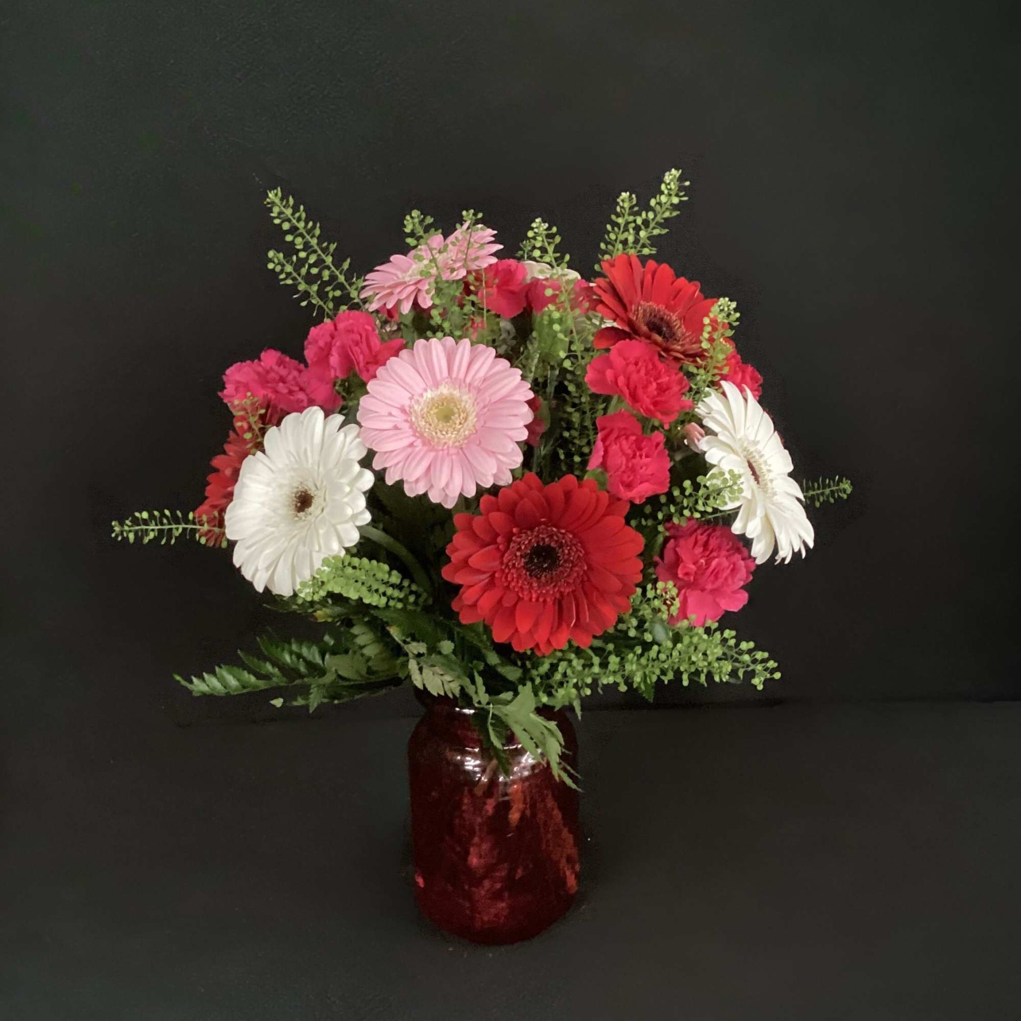 An instant brightener, send somebody a jar full of Gerbera Daisies. To