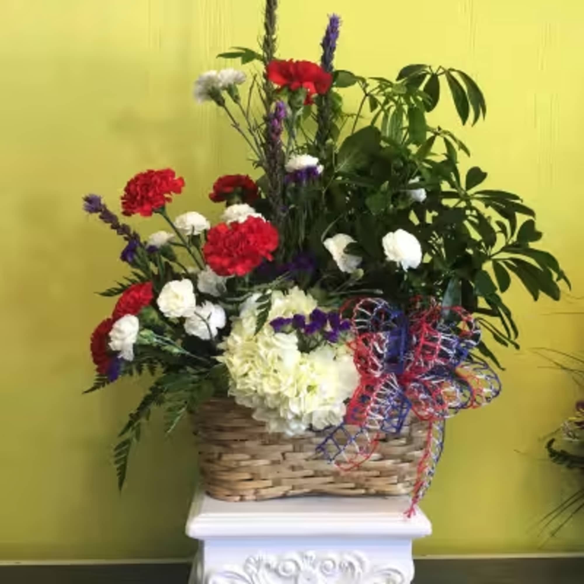 Double basket with green plant and beautiful floral arrangement
Picture will not look
