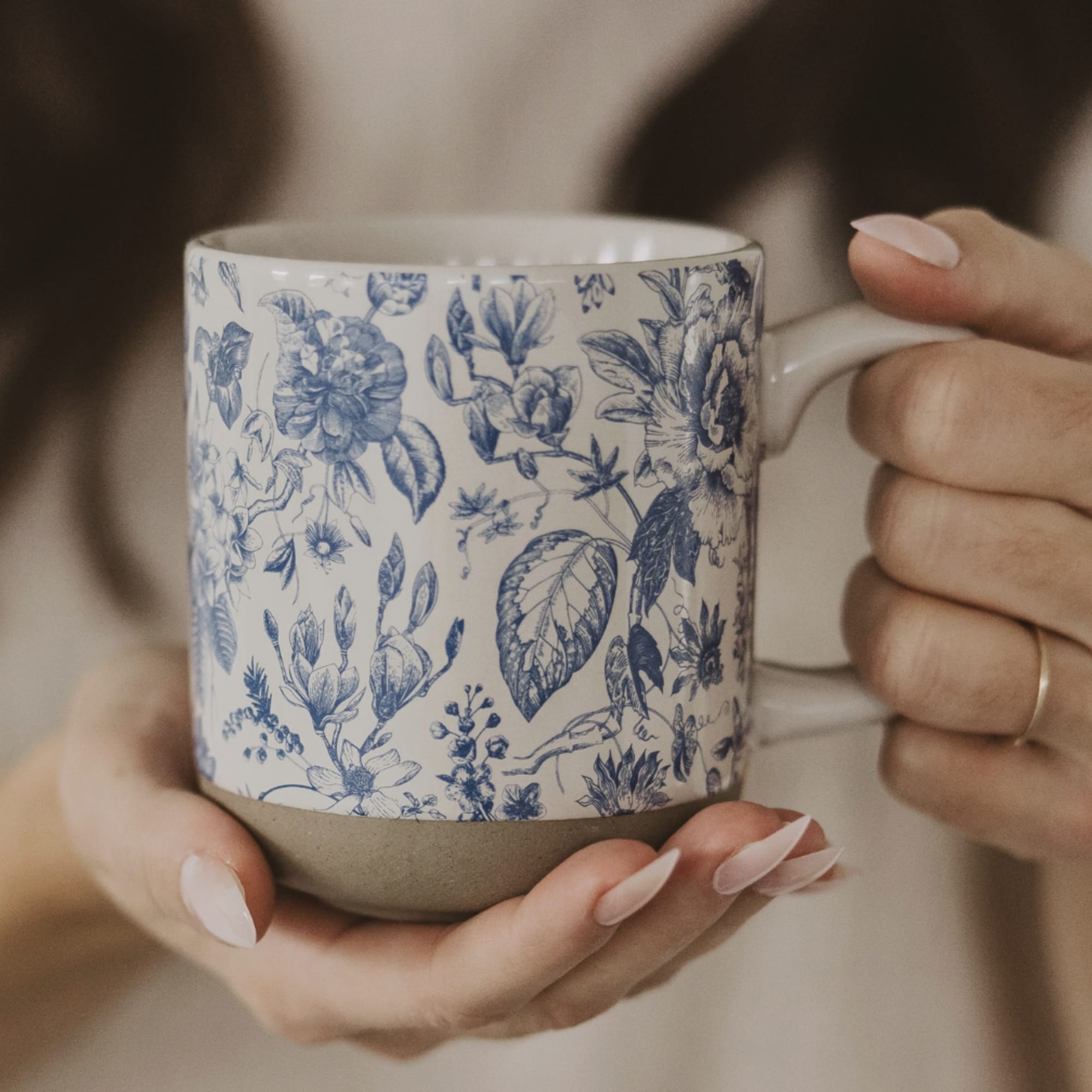 Our Blue Delft stoneware mug features a timeless floral design and calming