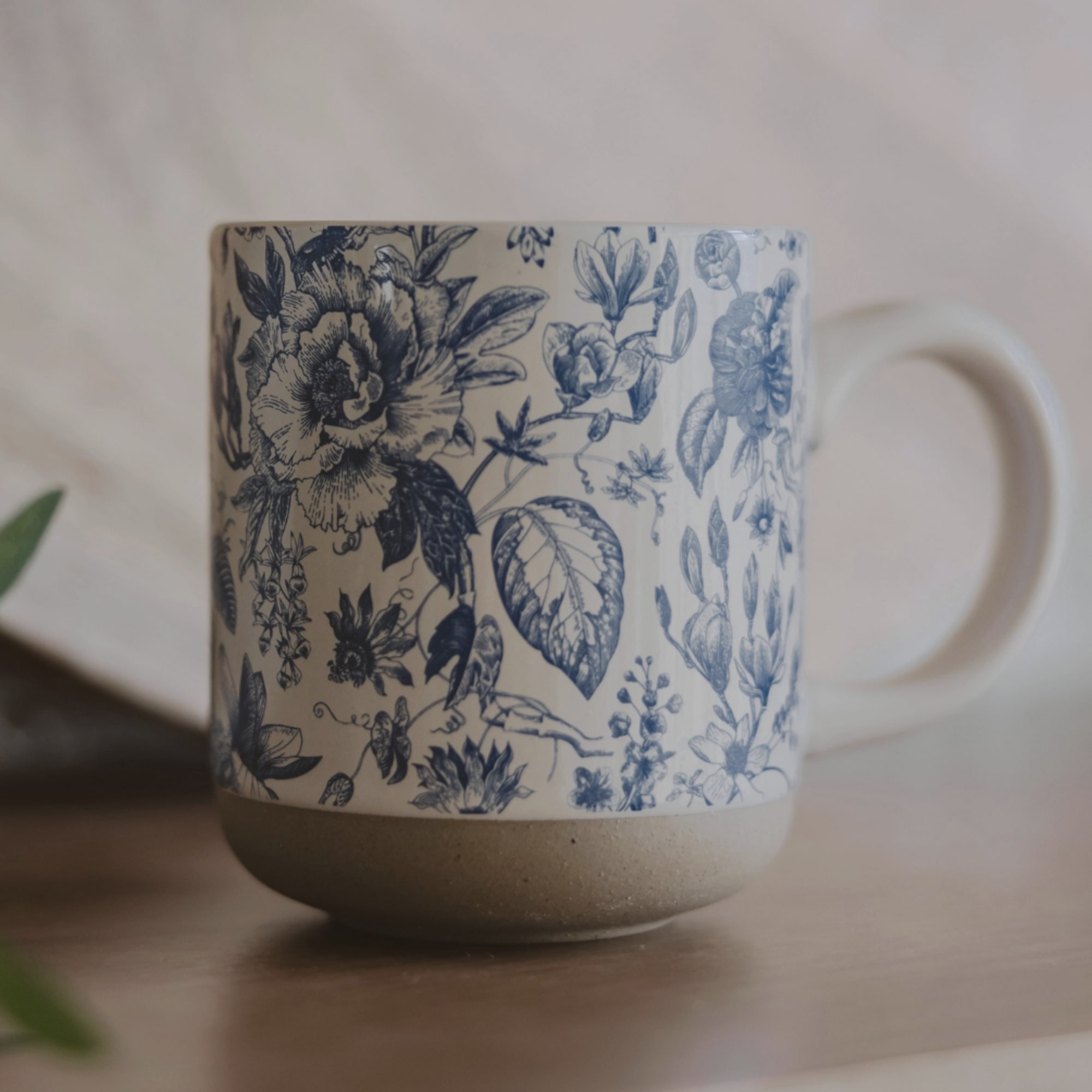 Our Blue Delft stoneware mug features a timeless floral design and calming