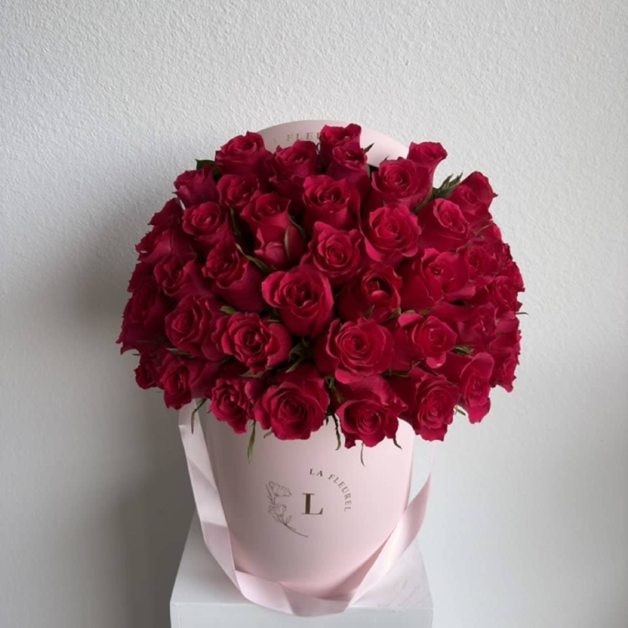 This beautiful arrangement filled with hot pink roses to deliver your special