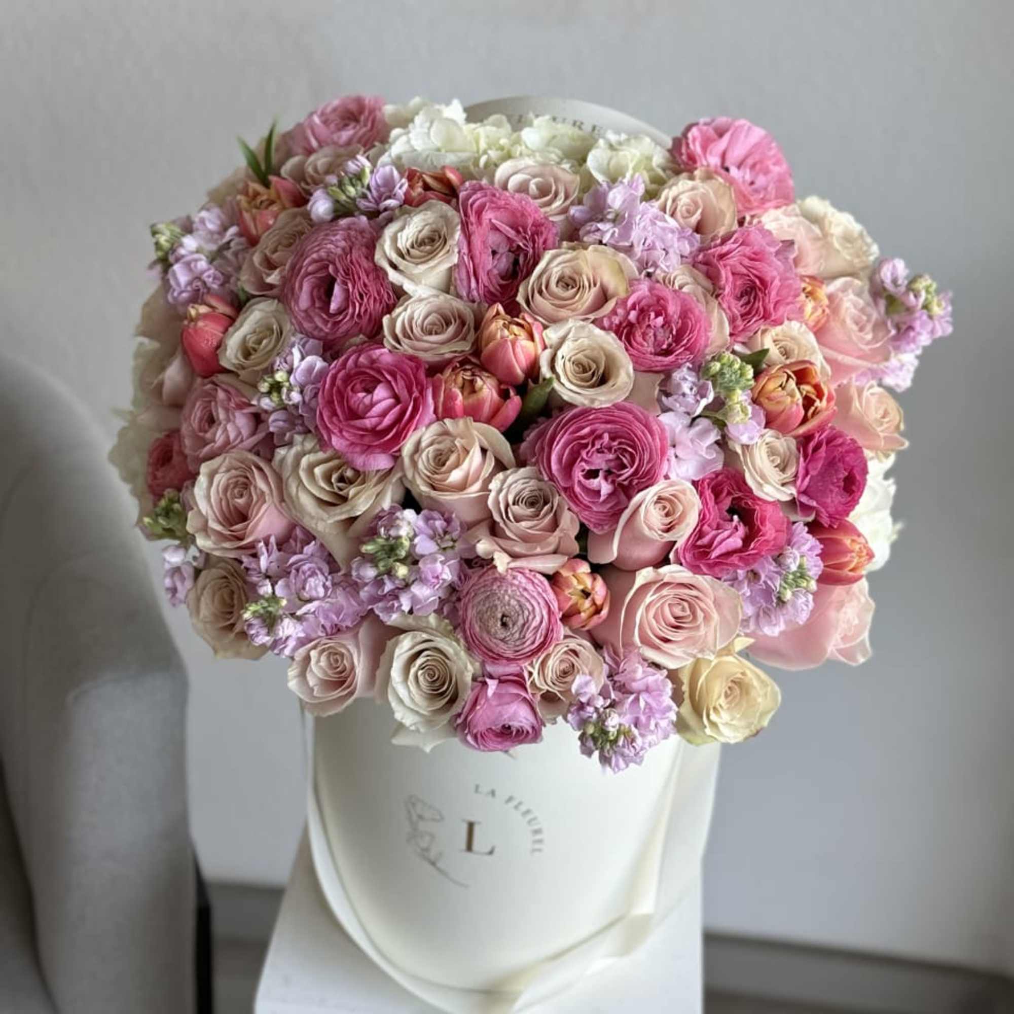"Spring Grace" is a captivating floral arrangement that embodies the essence of