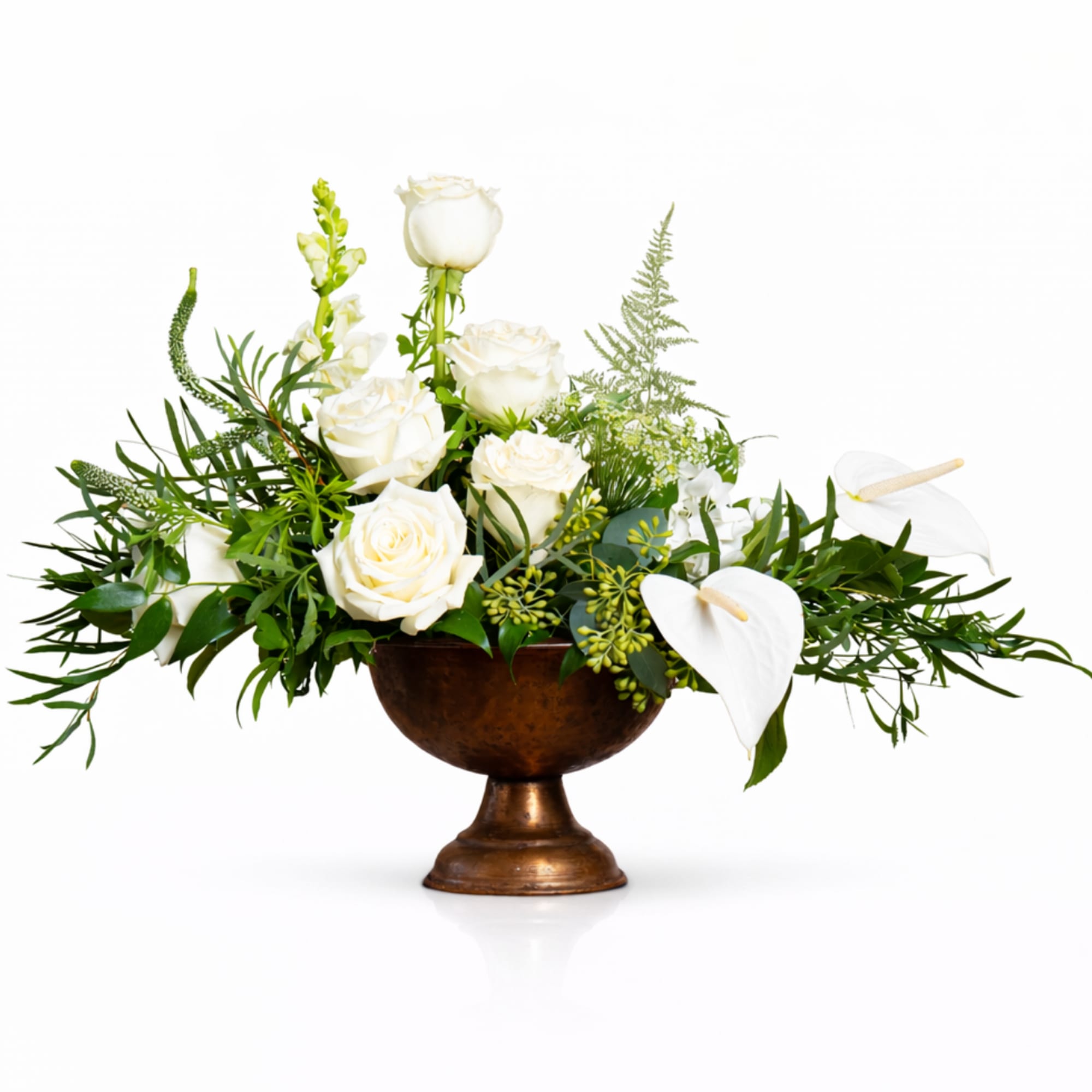 Pure and architectural, FAITH is an ode to simplicity. White roses, anthurium