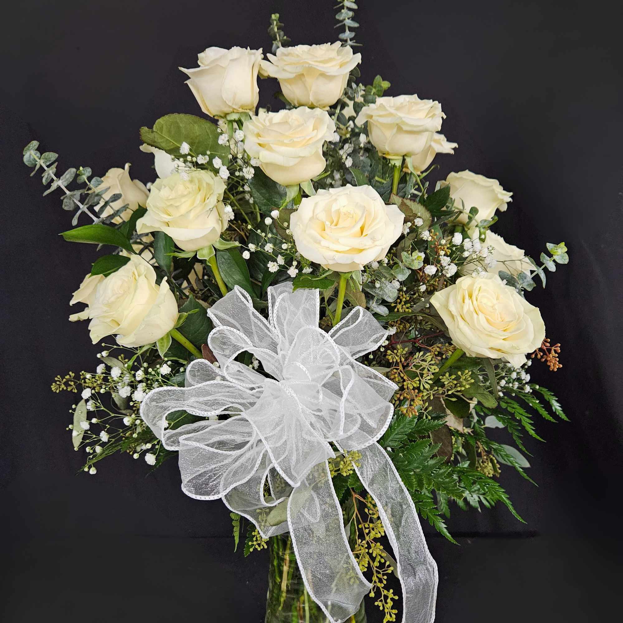 A dozen white roses are a classic gift! Perfect for Valentine's Day
