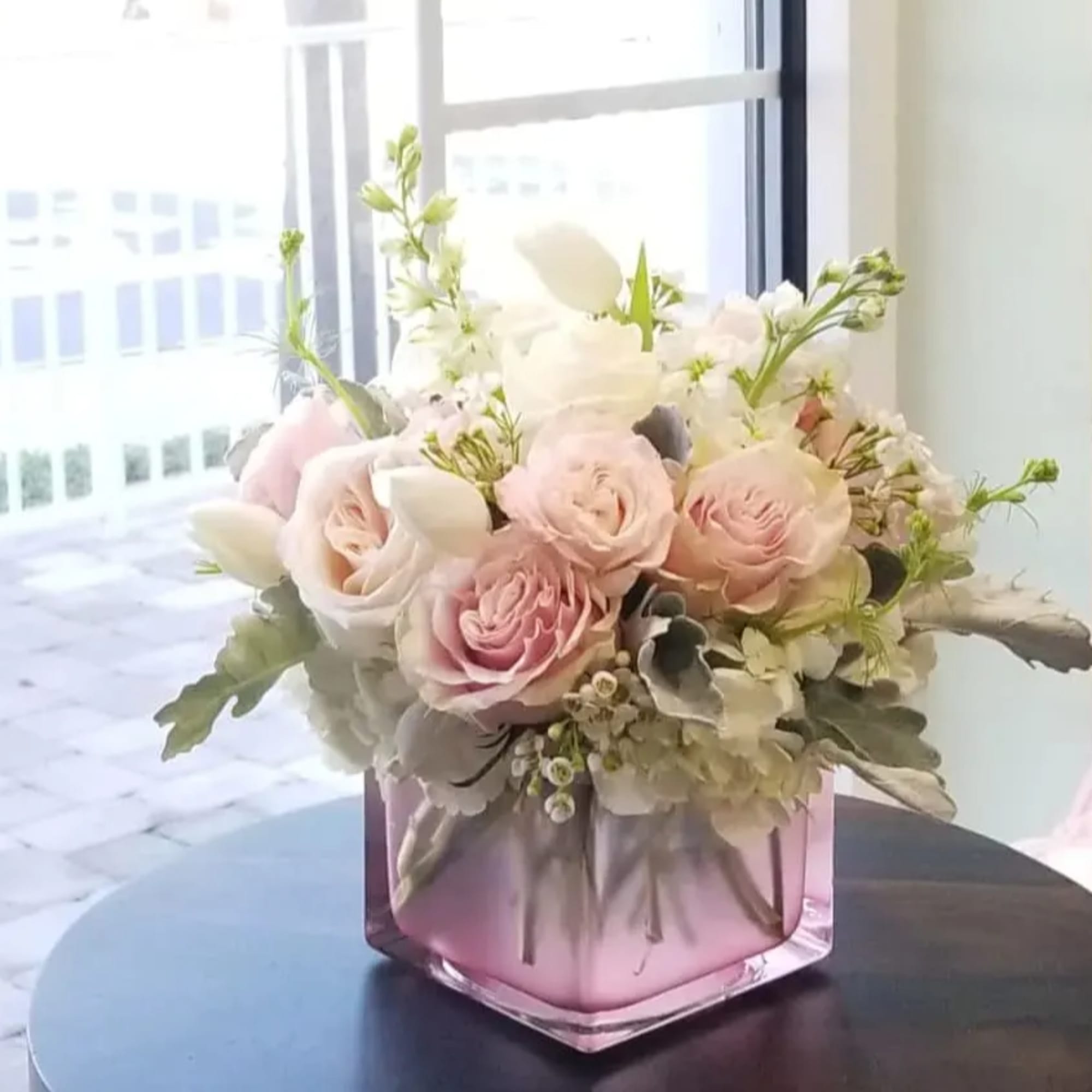 Daniela is a softly romantic floral arrangement that embodies grace, tenderness, and