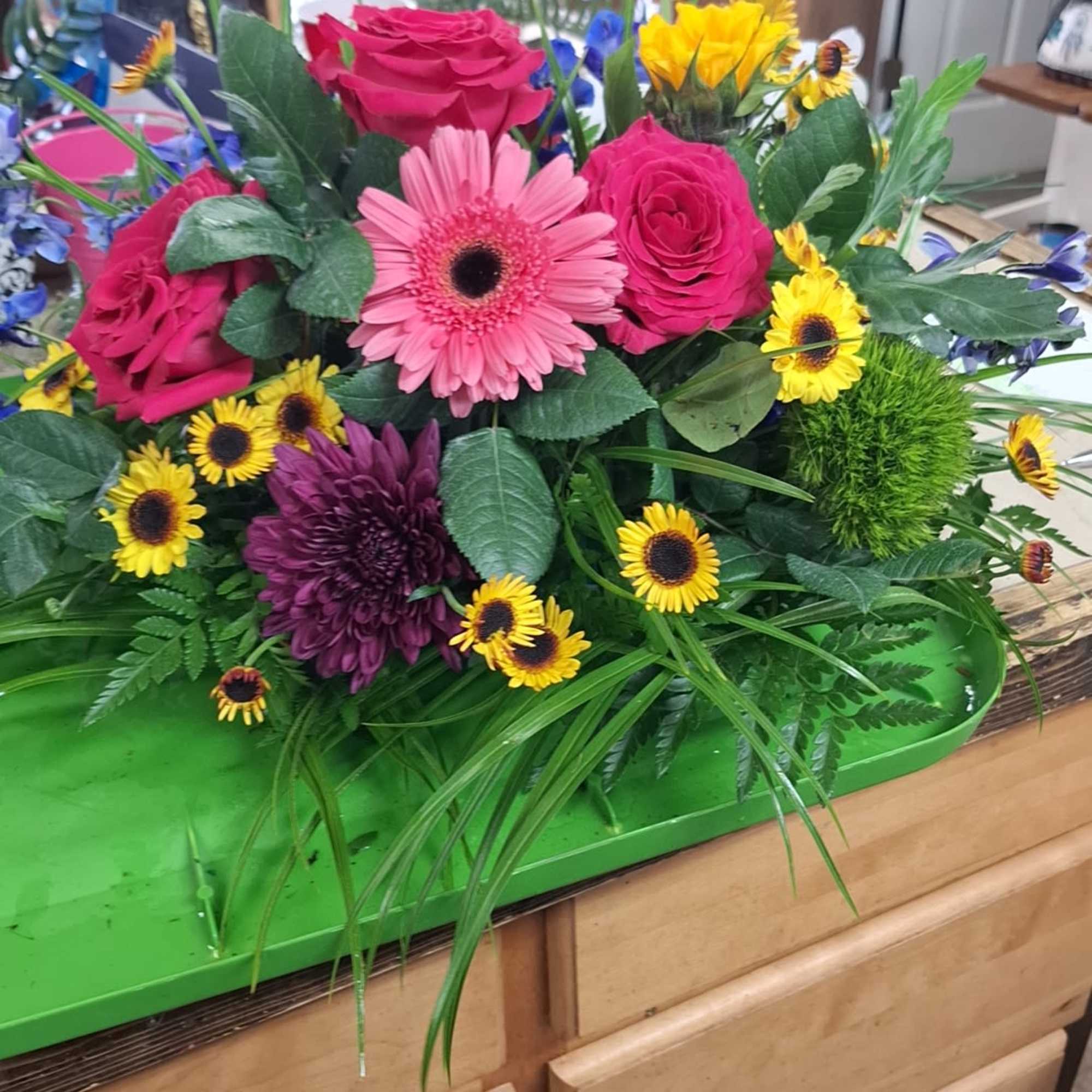 Rich and elegant, this all-red arrangement is a wonderful remembrance for your