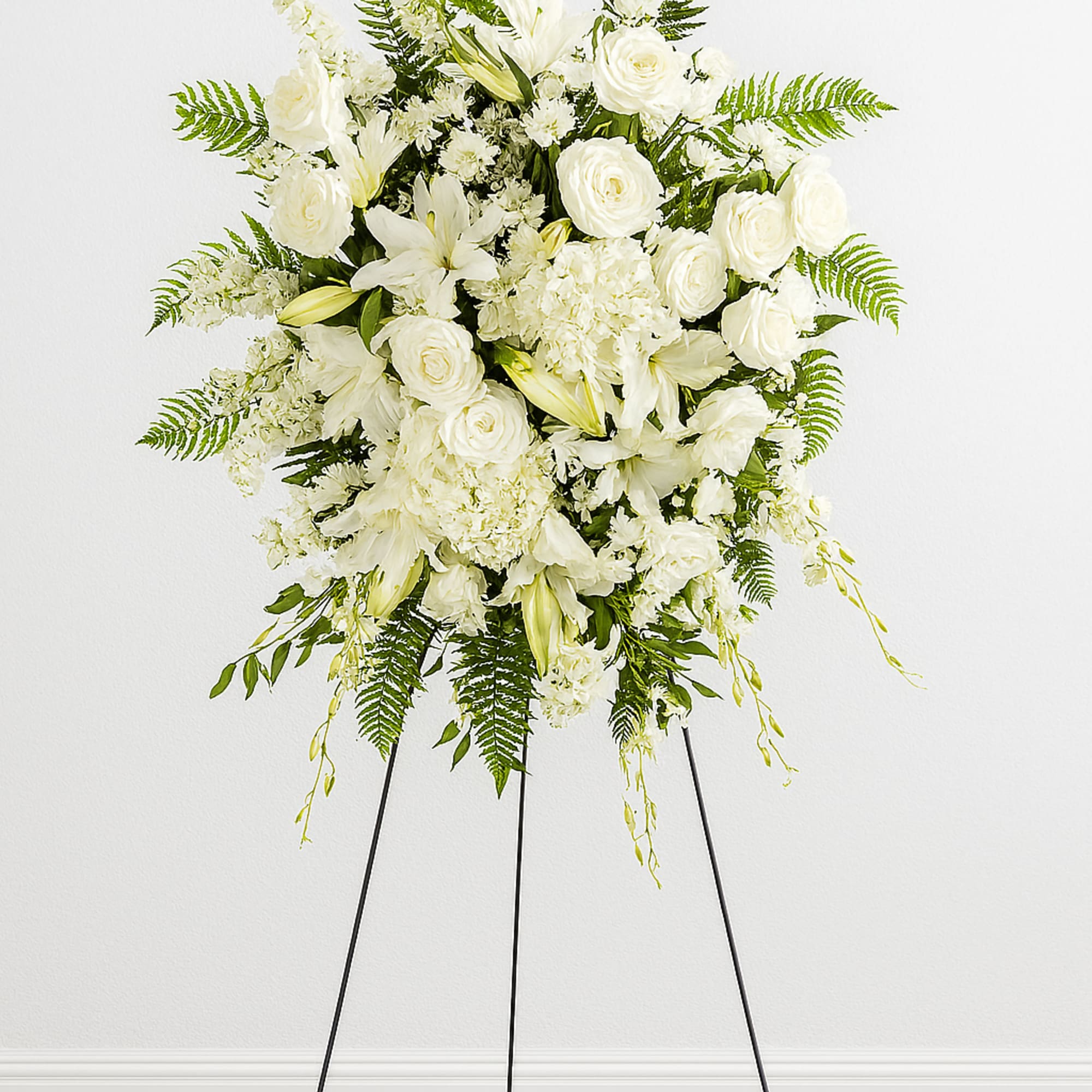 An all white tribute, this funeral spray is pure and tranquil. Featuring