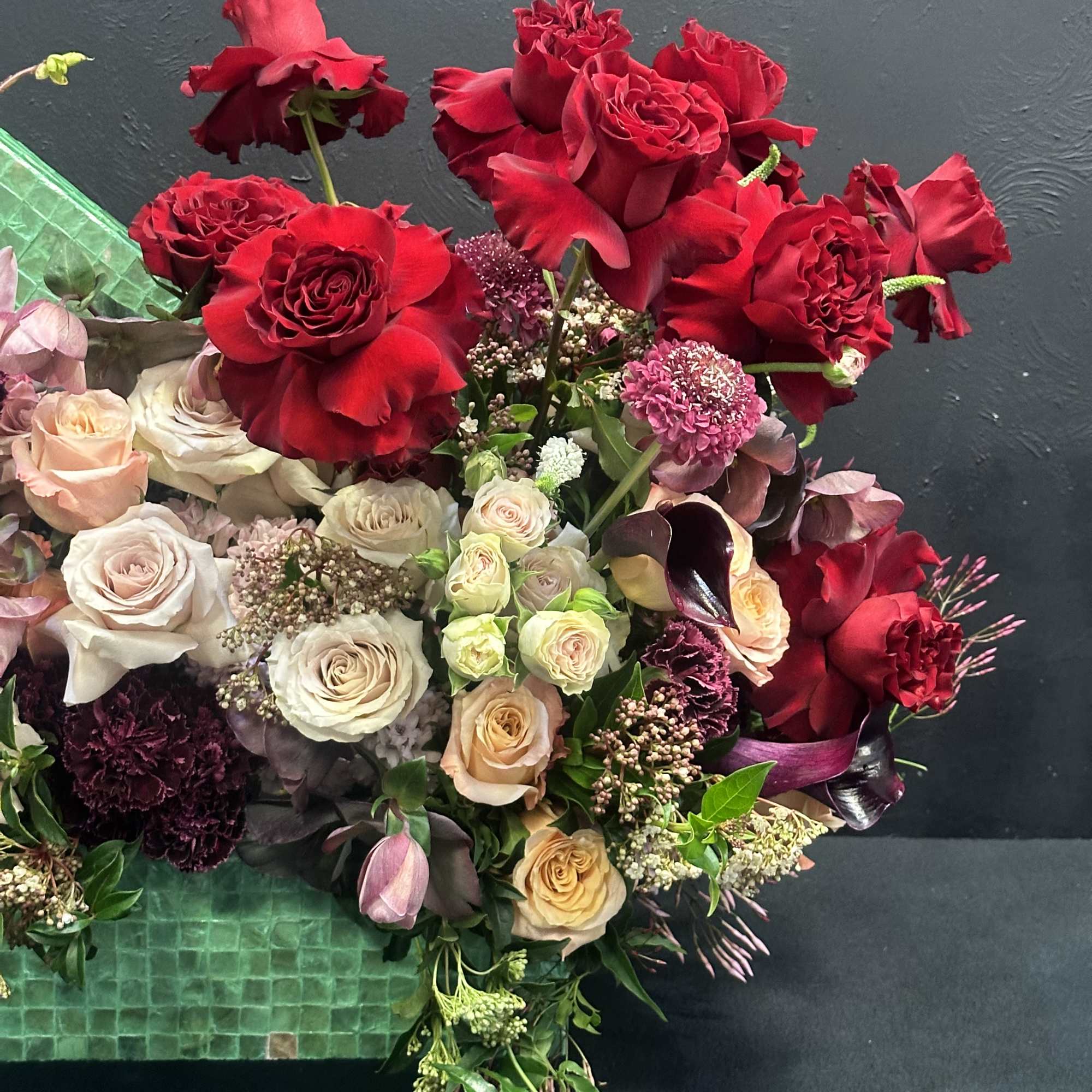 Enchanting Elegance embodies the epitome of floral sophistication. At its heart, pristine