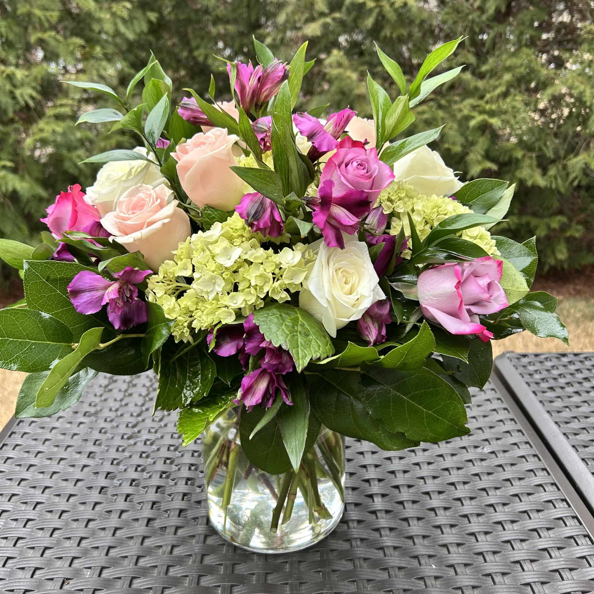 This arrangement a true symbol of luxury.

Bloom Details: White Roses, Green Hydrangeas