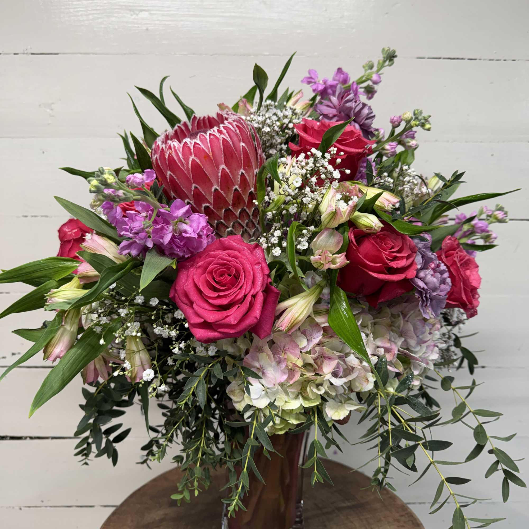 Surprise your special one with this gorgeous arrangement and show them that