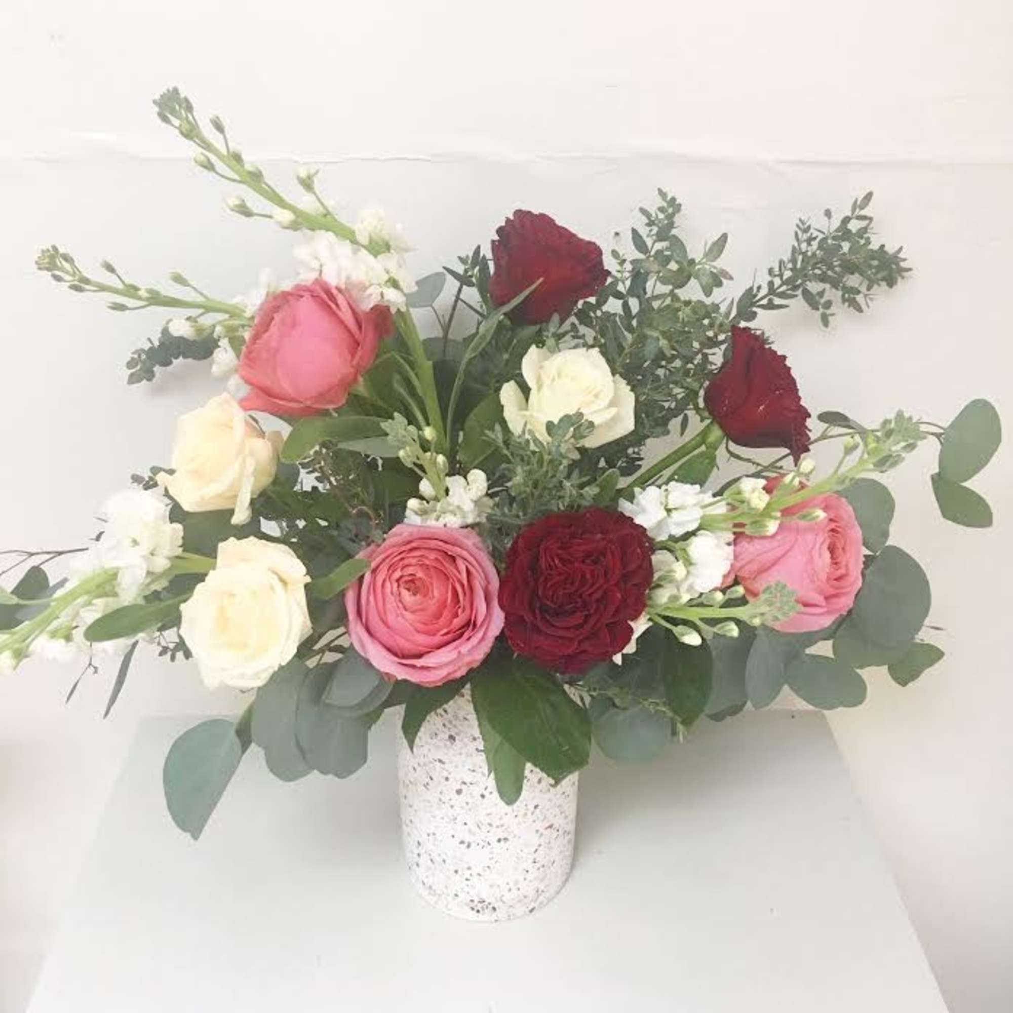 A new classic for spreading love! This terrazzo vase overflowing with pink